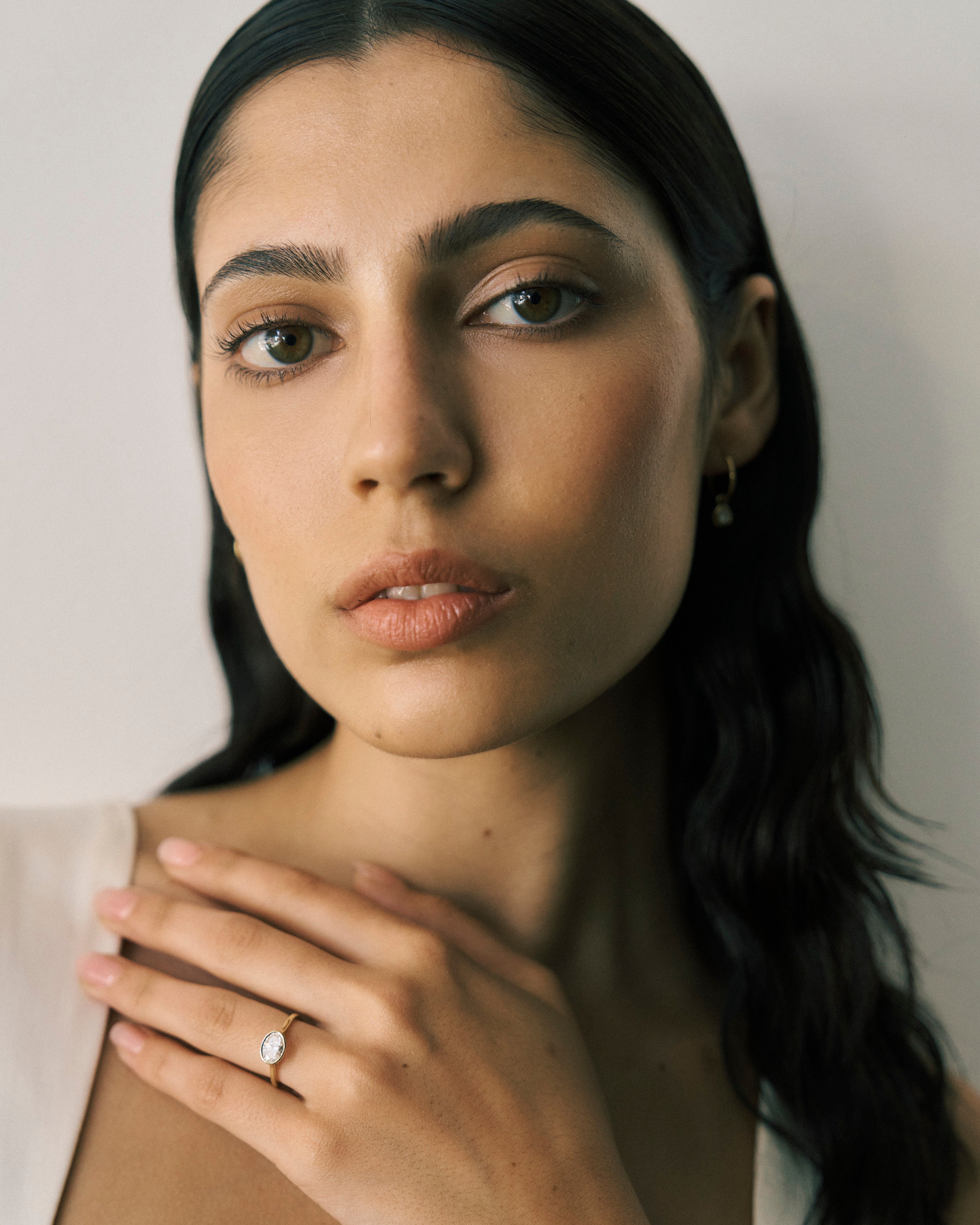 Oval Cut East-West Bezel Engagement Ring