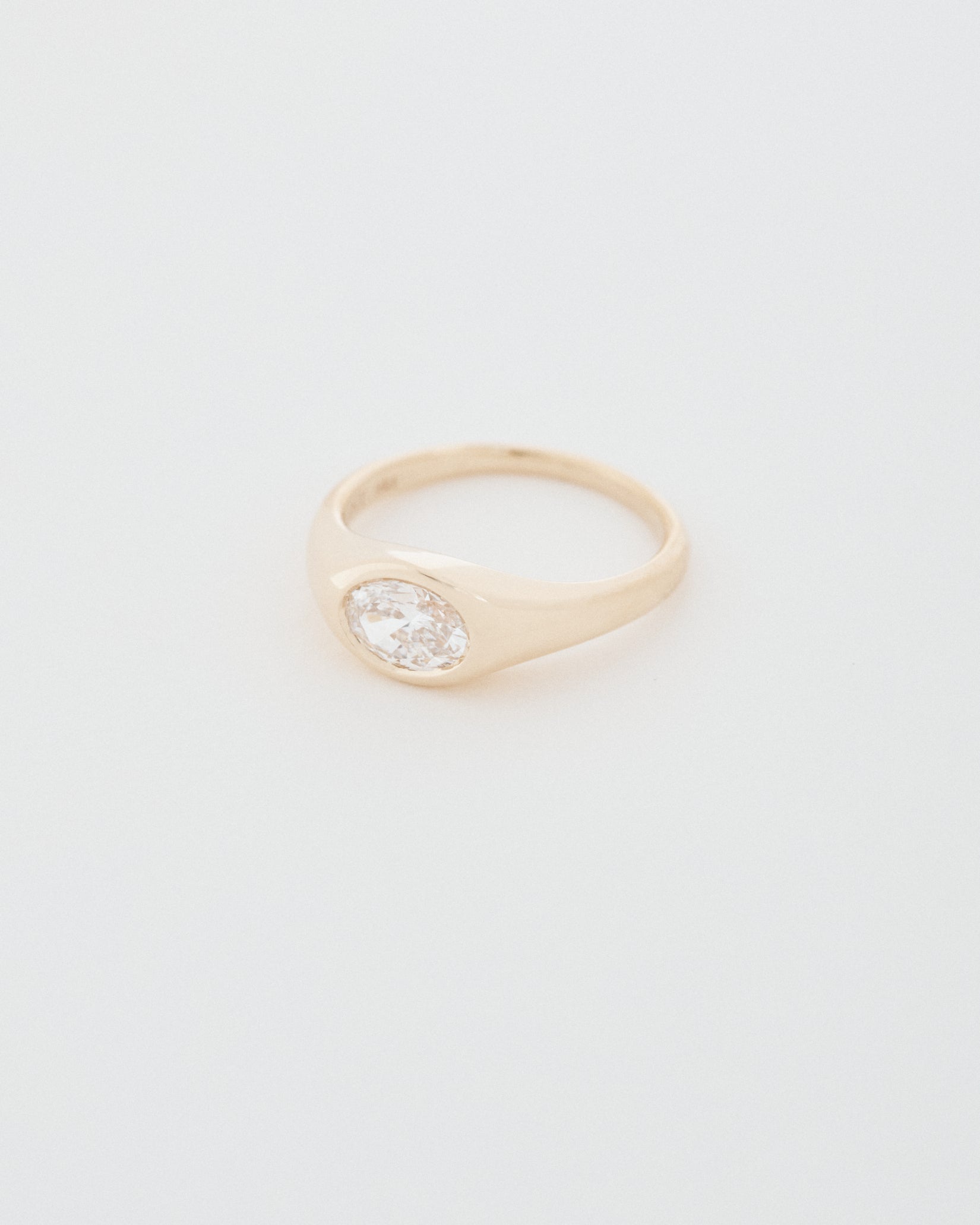 Oval Cut East-West Signet Engagement Ring