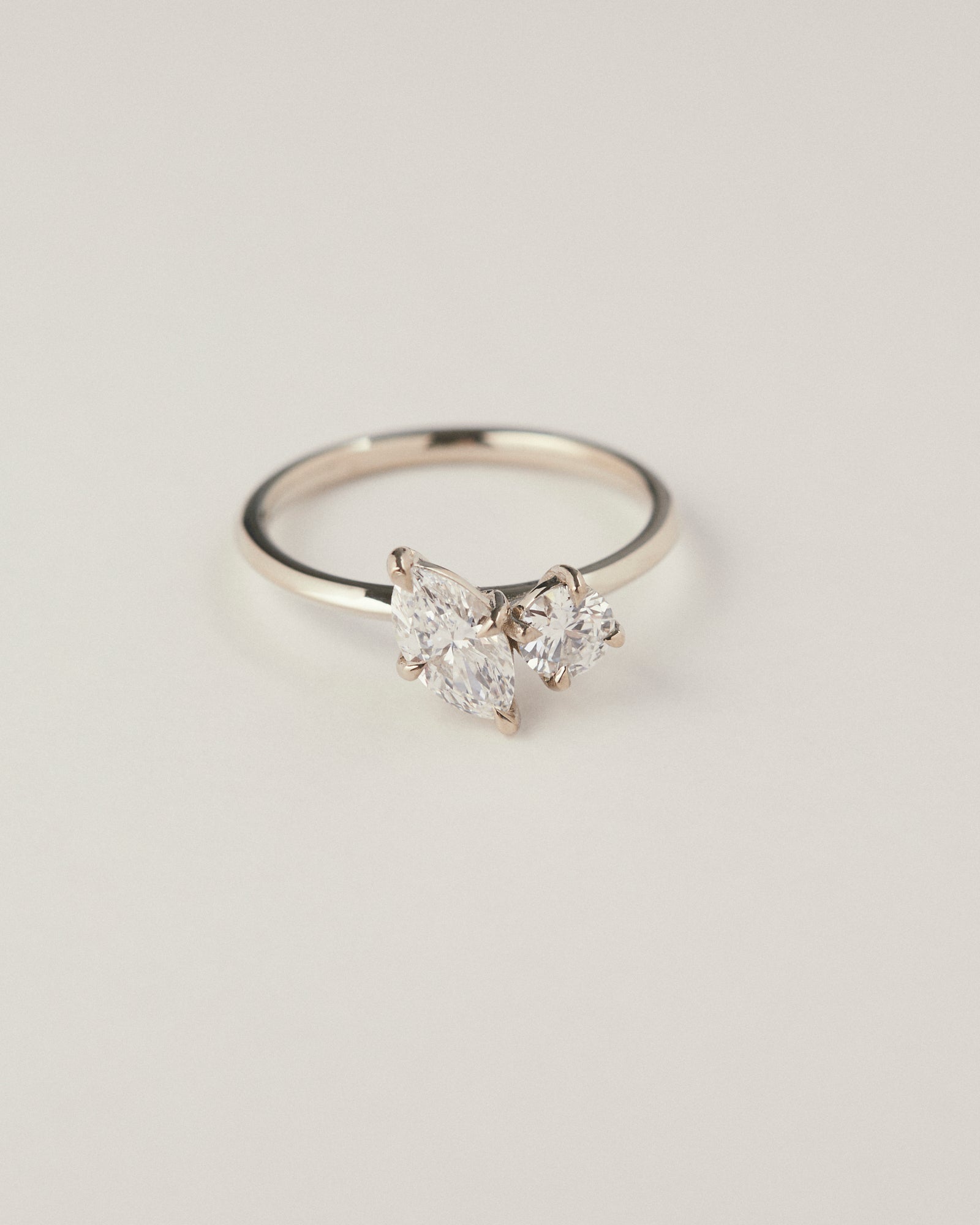 0.64ct Marquise and 0.45ct round cut diamond engagement ring.