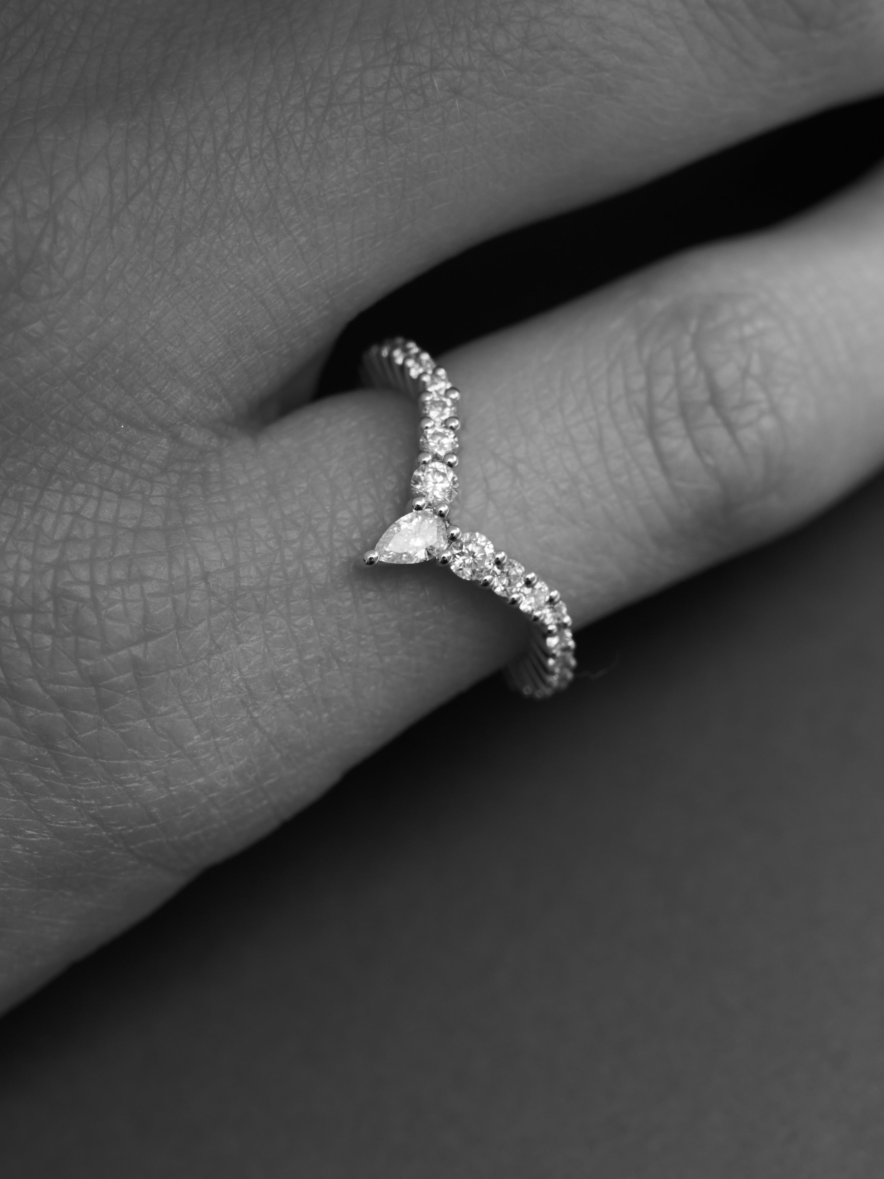 Pear and round cut lab grown diamond wedding band.