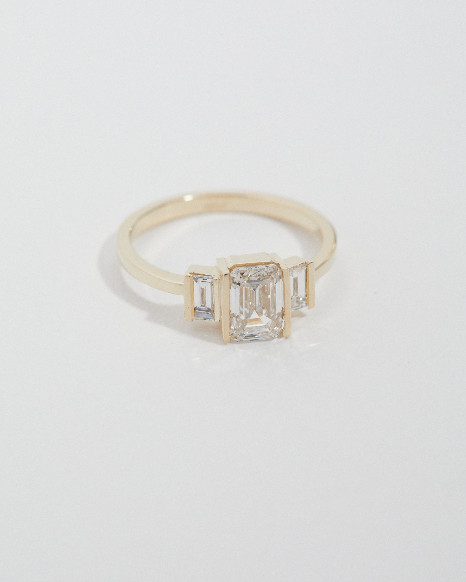 1.01ct emerald cut and baguette diamond trilogy.