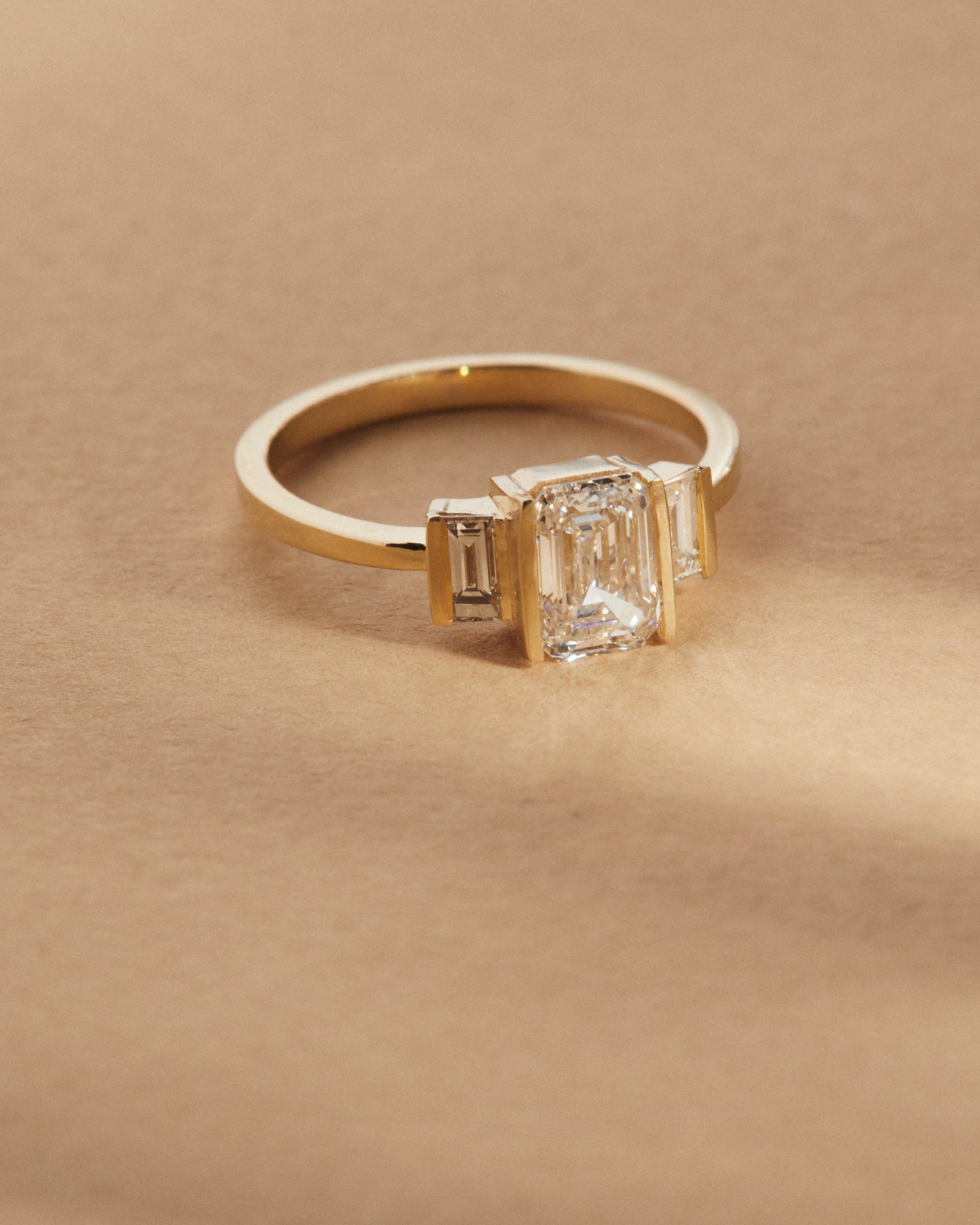 1.01ct emerald cut and baguette diamond trilogy.