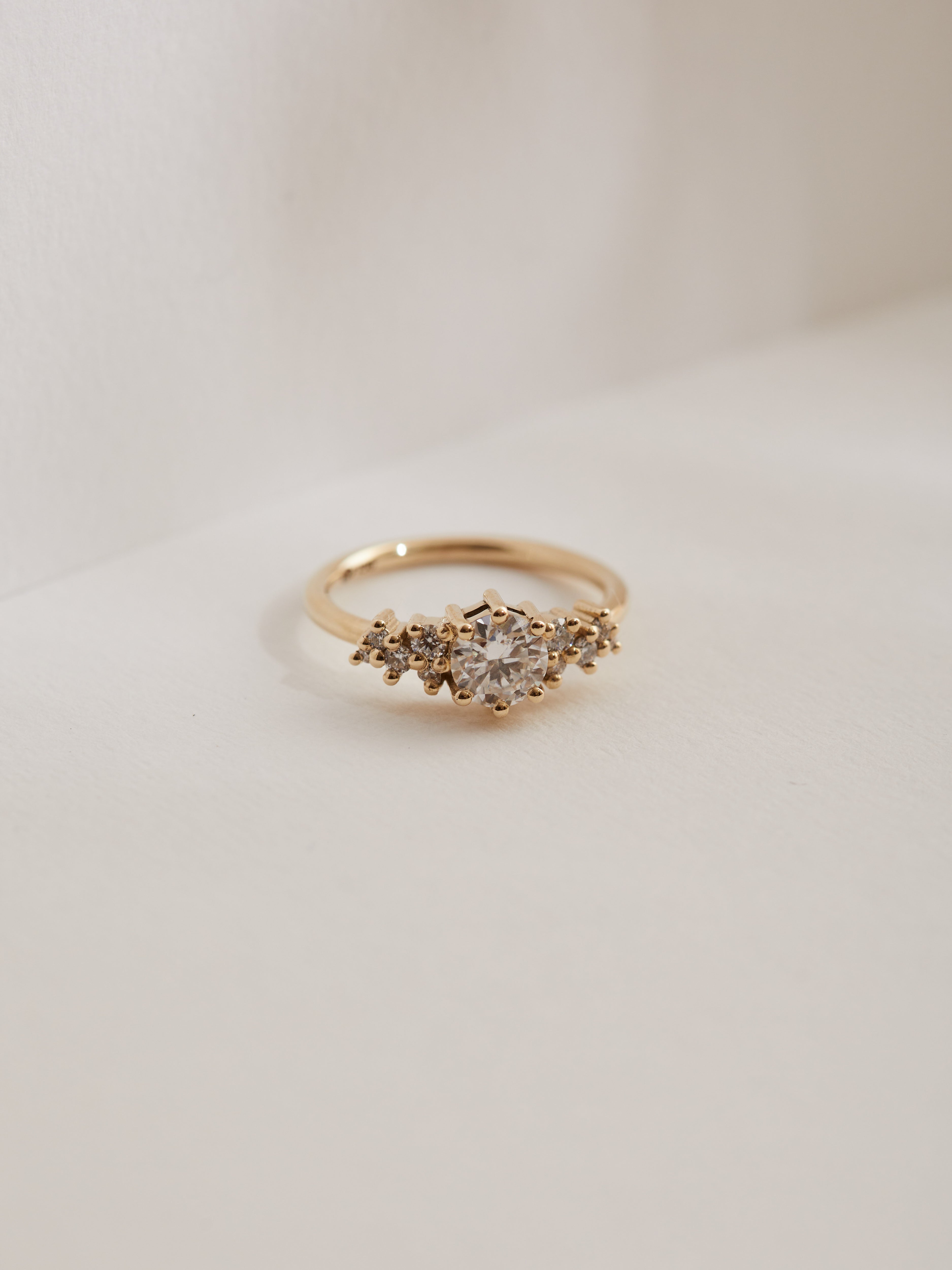 1ct Moissanite cluster ring.