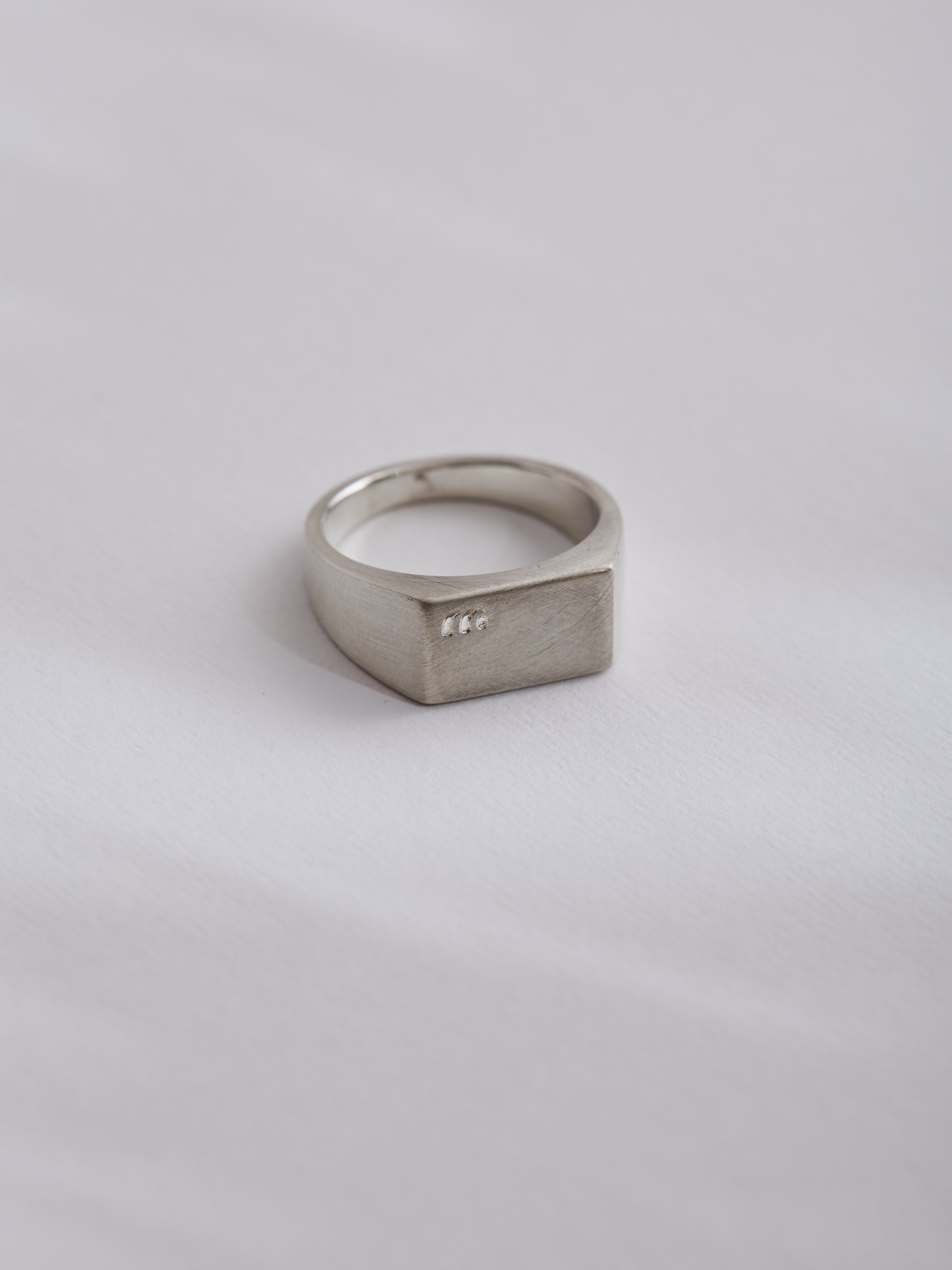 Sterling silver rectangular signet.