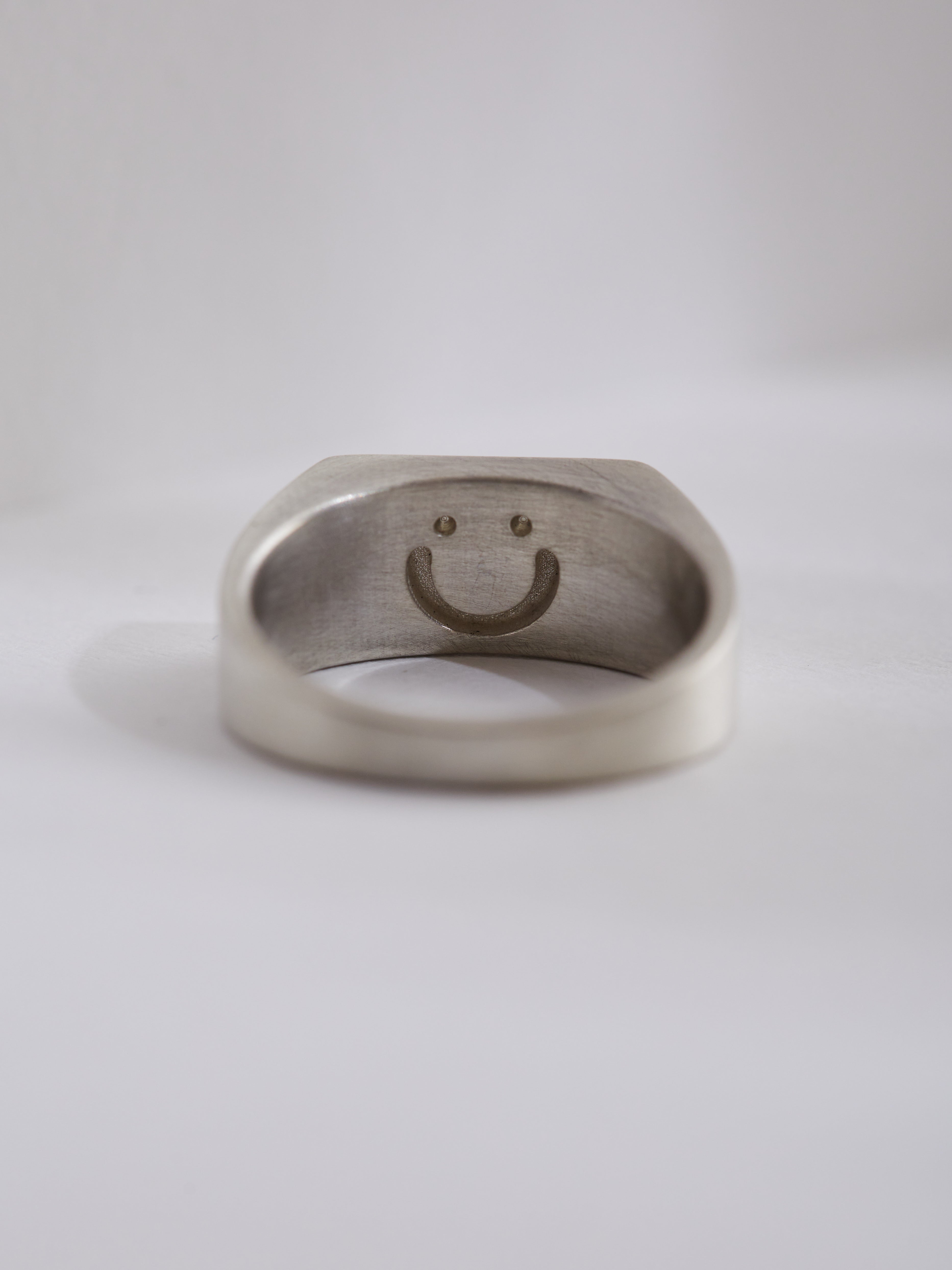 Sterling silver rectangular signet.