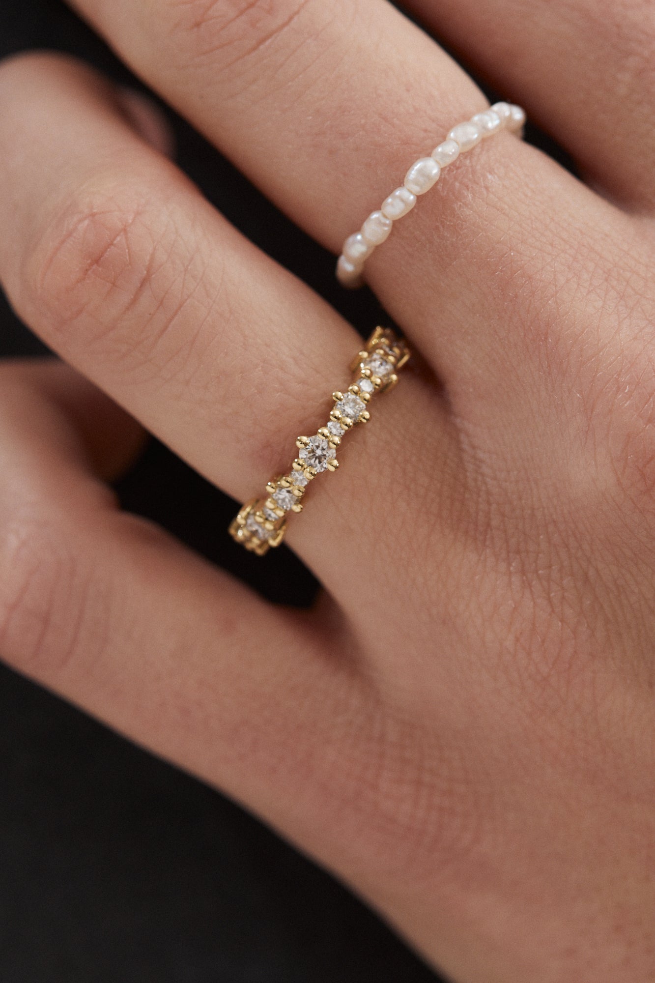 Celestial half eternity wedding band with alternating diamonds.