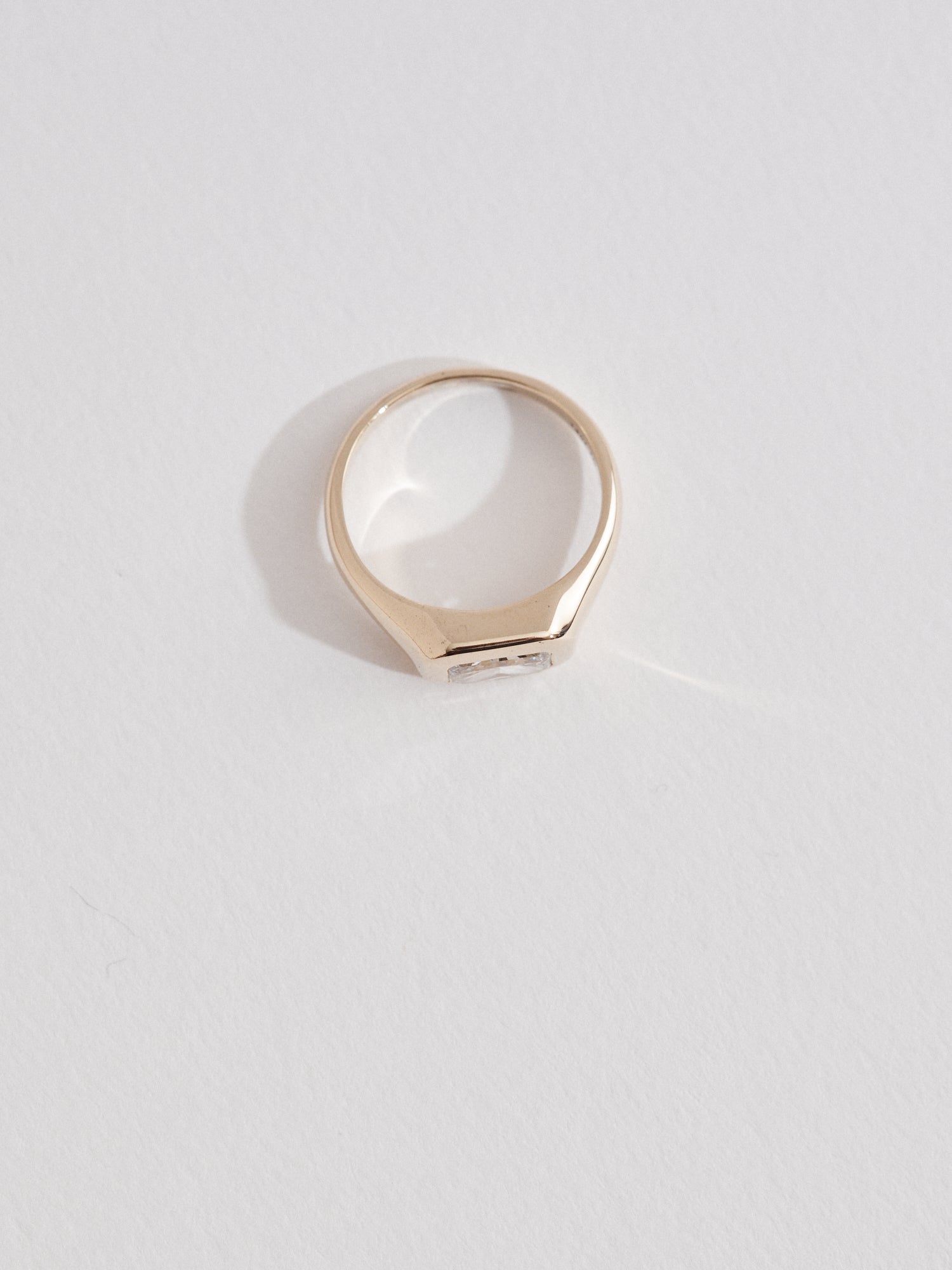 1.21ct Radiant cut signet ring.