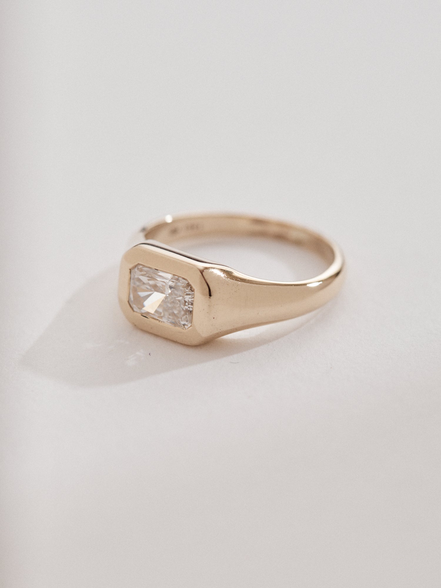1.21ct Radiant cut signet ring.