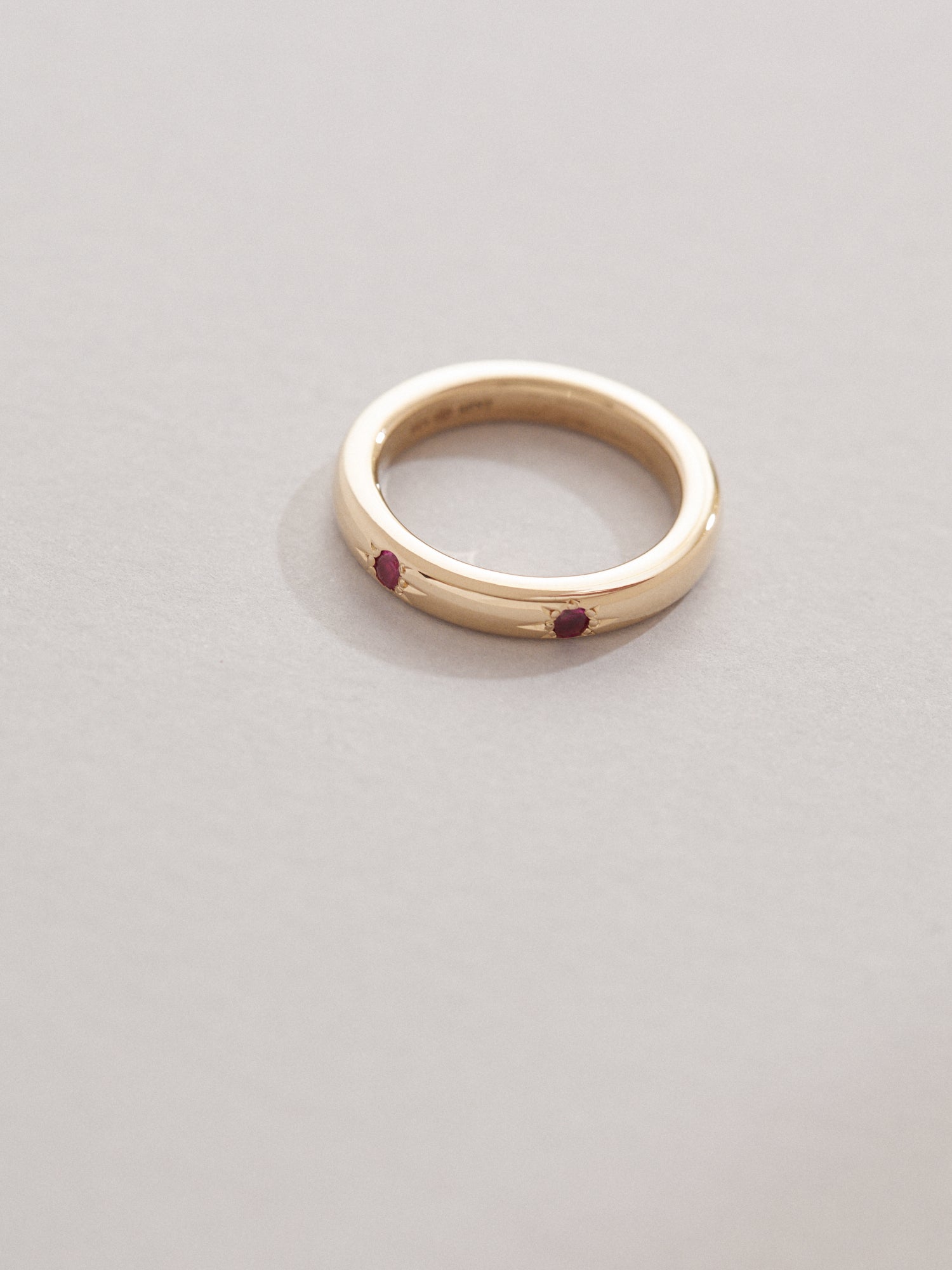 0.06ct Ruby star pavé band.