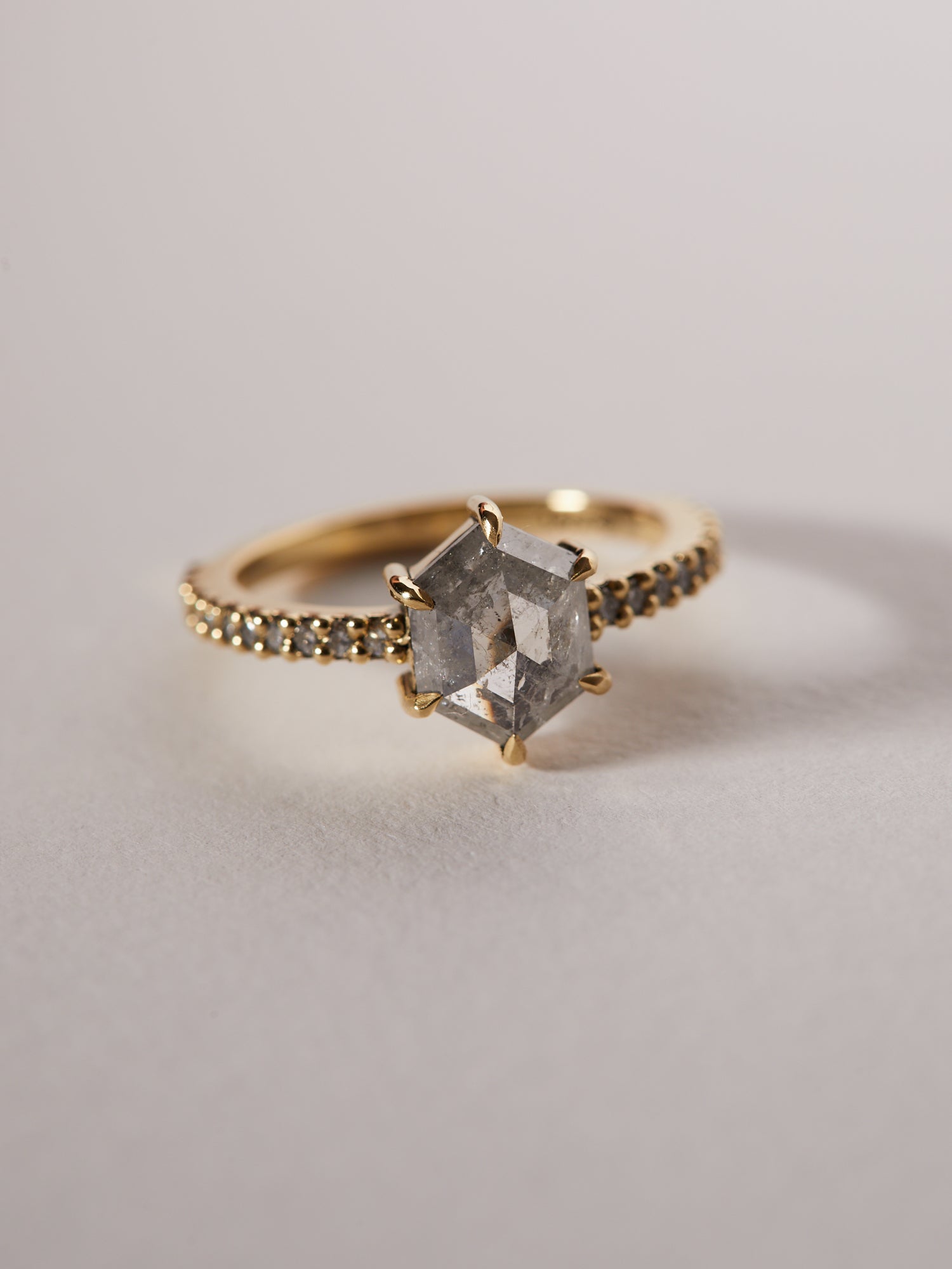 1.43ct hexagon rose cut salt and pepper diamond solitaire with 0.01ct diamond pavé band.