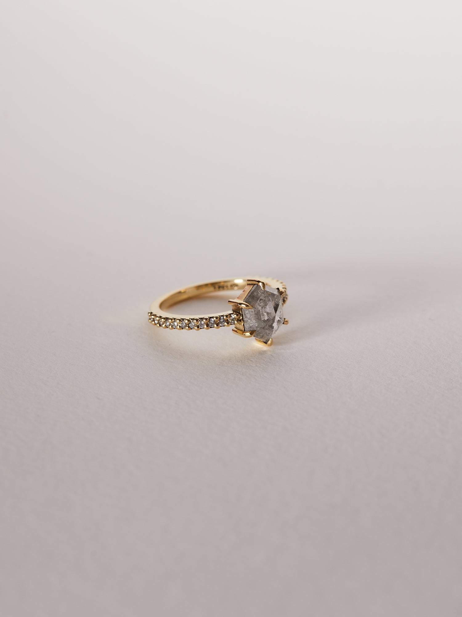 1.43ct hexagon rose cut salt and pepper diamond solitaire with 0.01ct diamond pavé band.