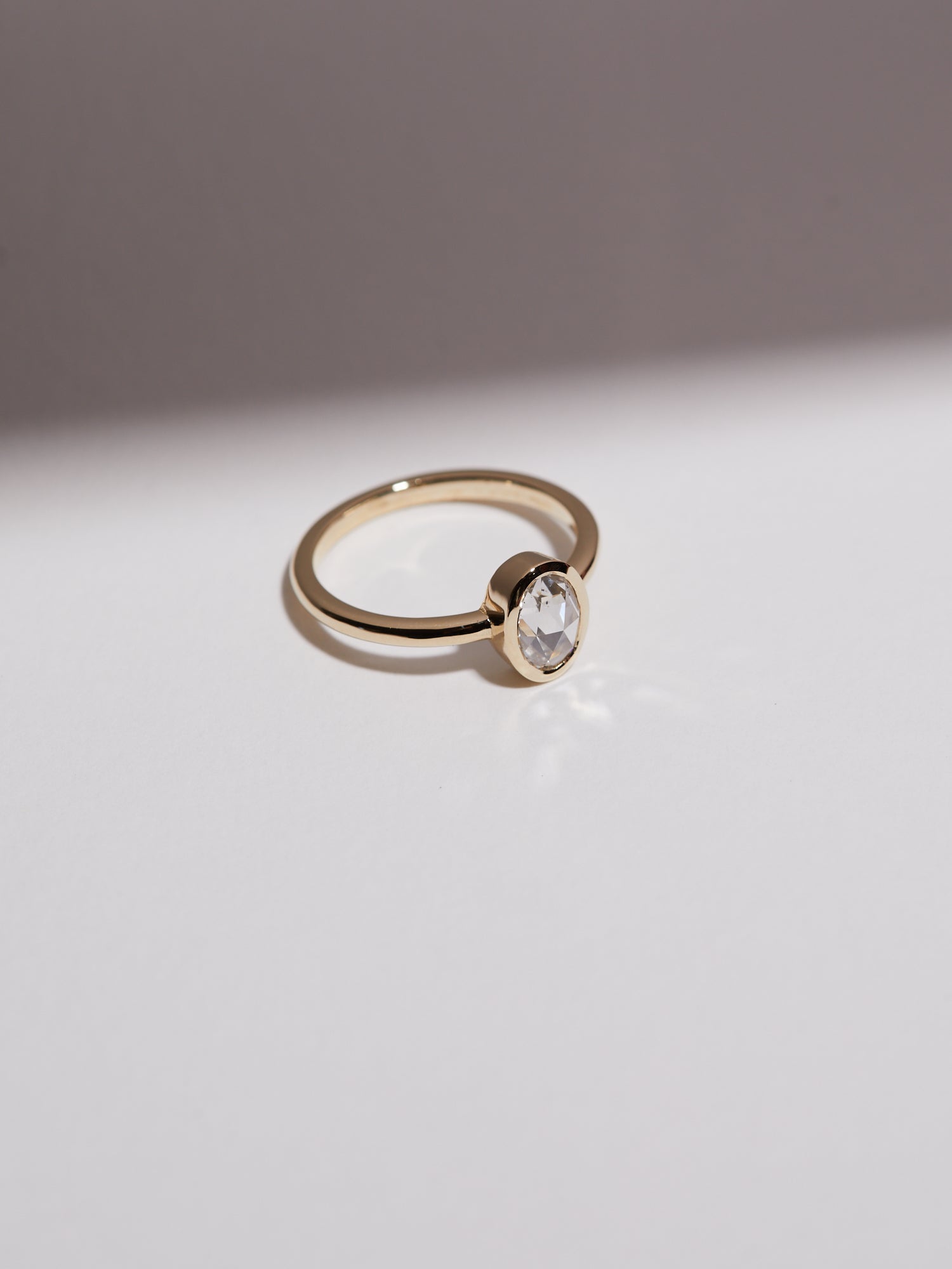 0.617ct Rose cut oval diamond bezel solitaire.