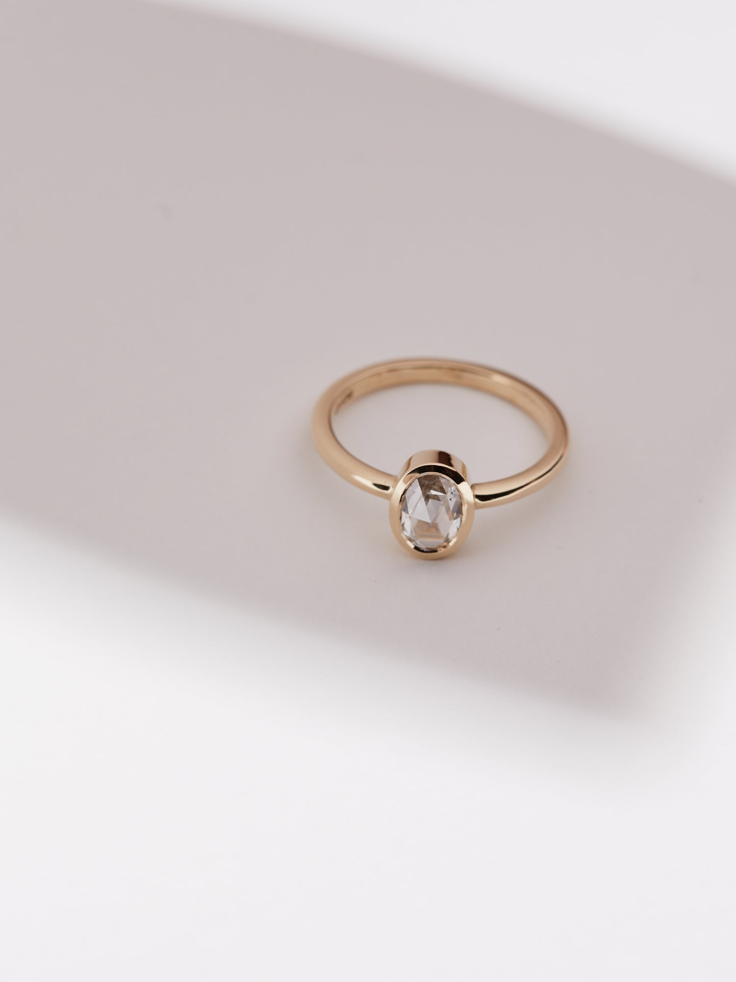 0.617ct Rose cut oval diamond bezel solitaire.