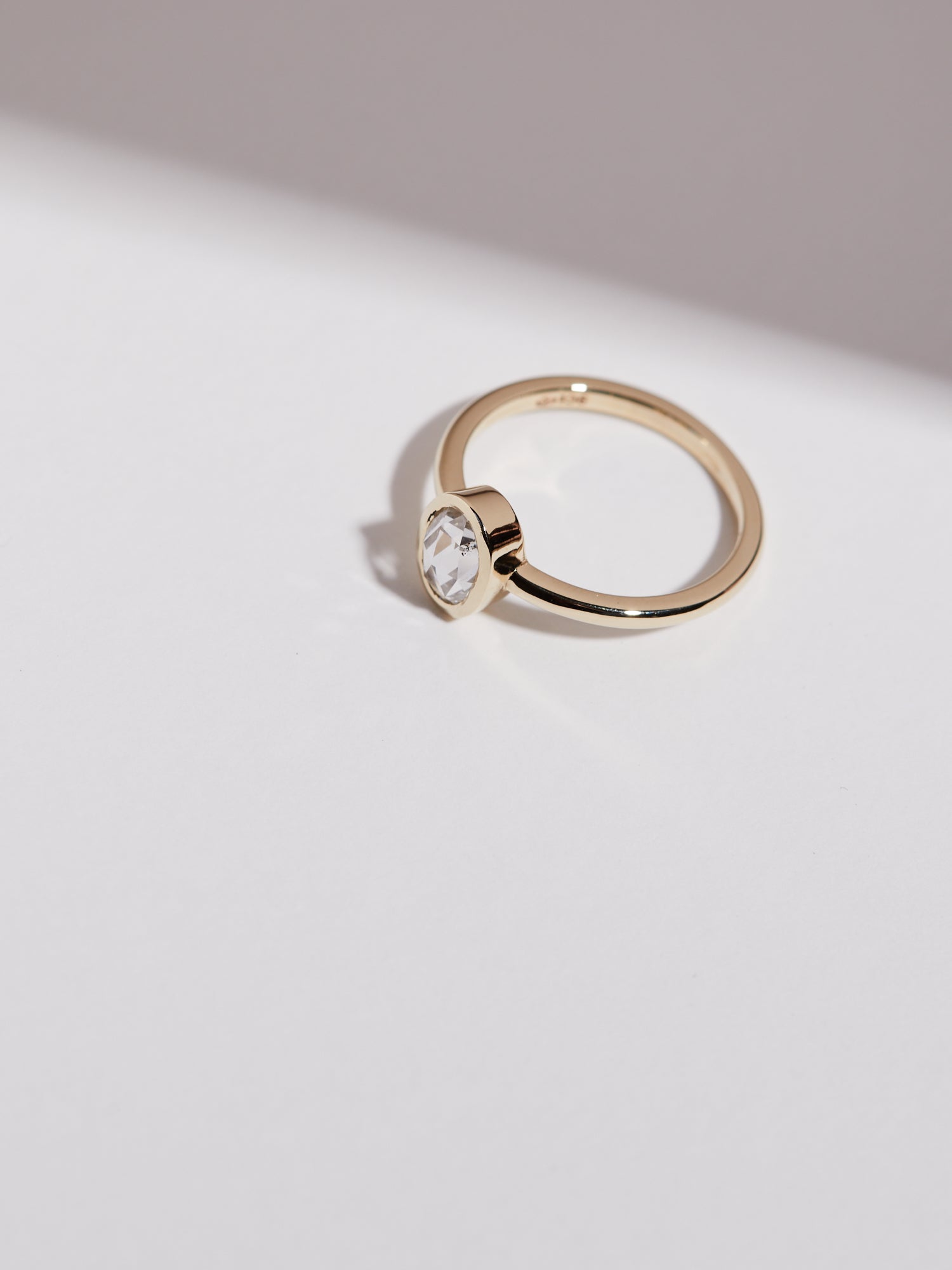 0.617ct Rose cut oval diamond bezel solitaire.