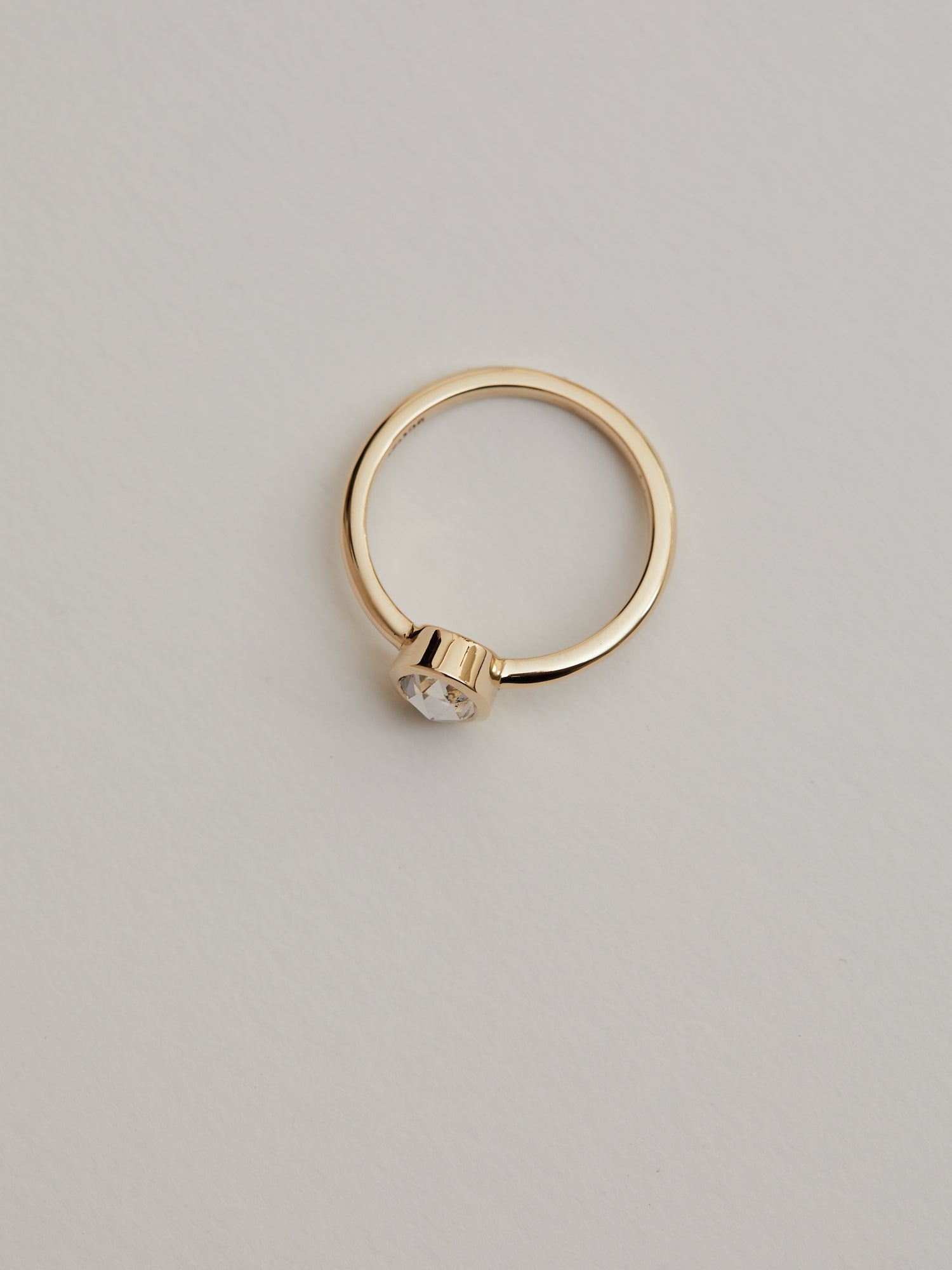 0.617ct Rose cut oval diamond bezel solitaire.