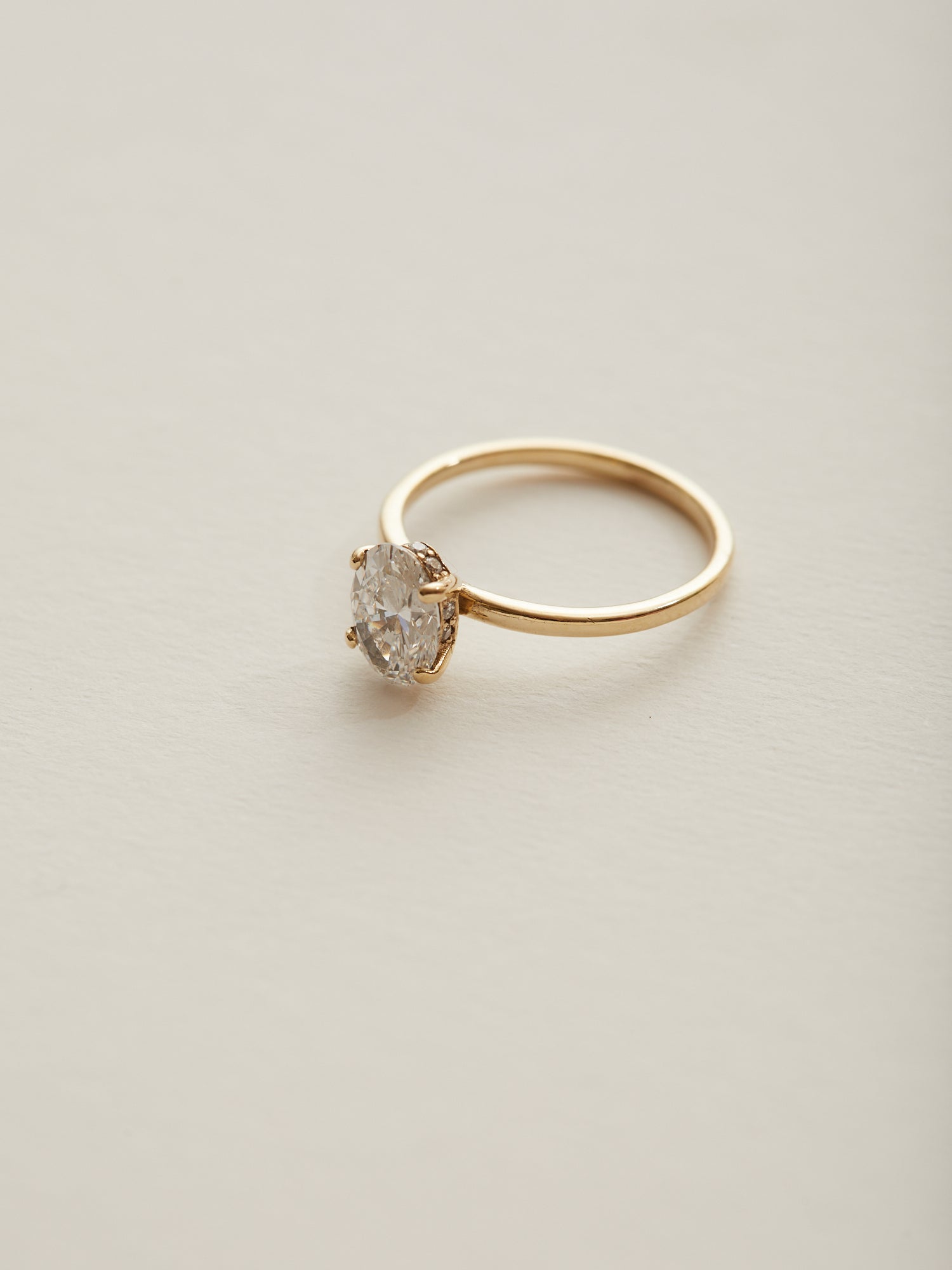 0.90ct Oval diamond solitaire with 0.005ct hidden halo.
