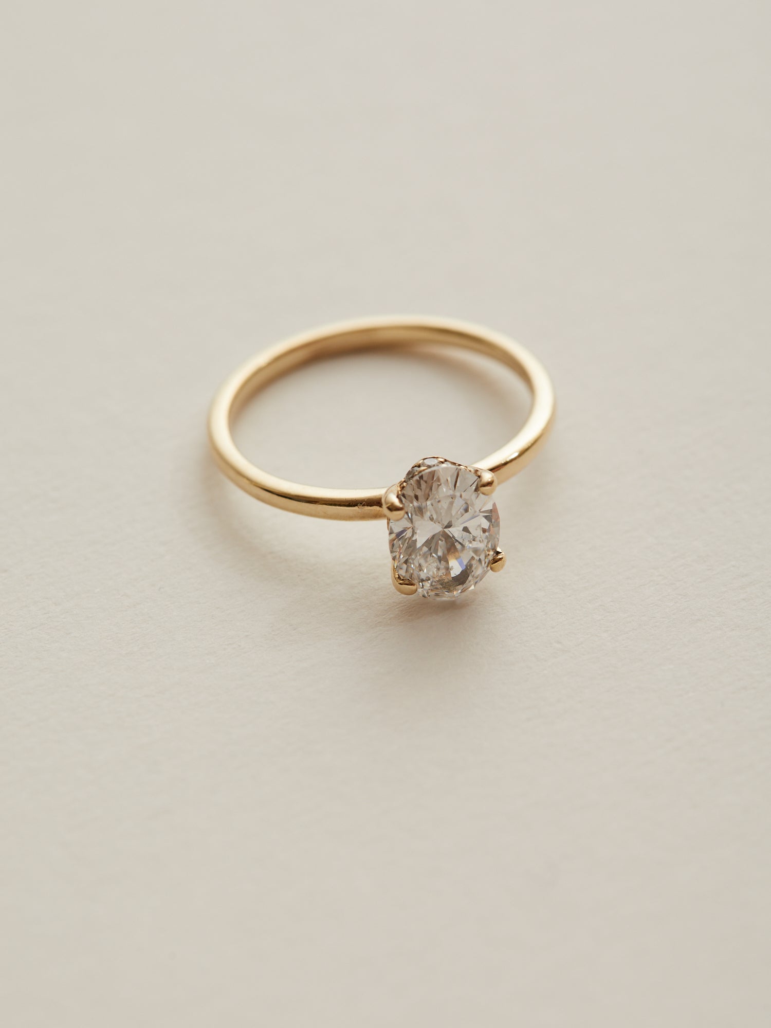 0.90ct Oval diamond solitaire with 0.005ct hidden halo.