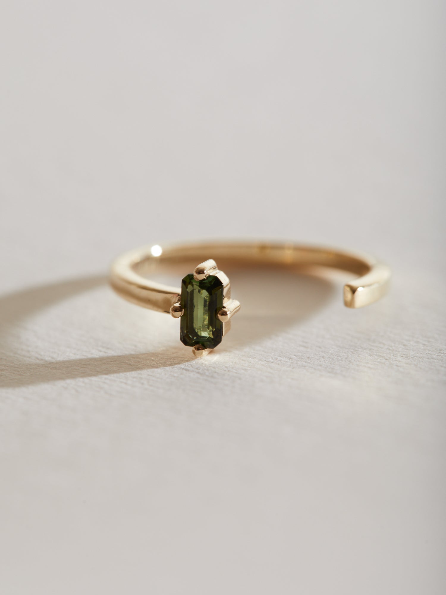 Emerald cut olive green Tourmaline cut out band