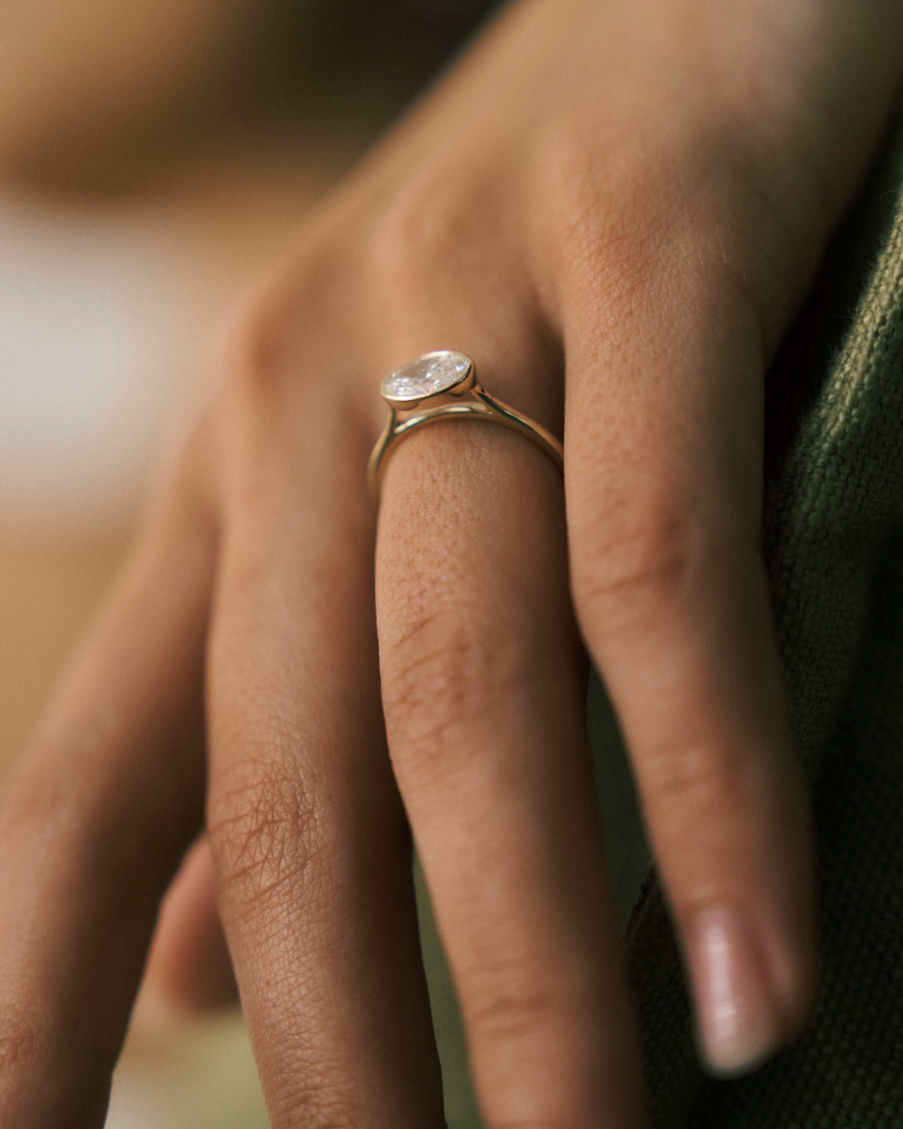 Oval Cut East-West Bezel Engagement Ring