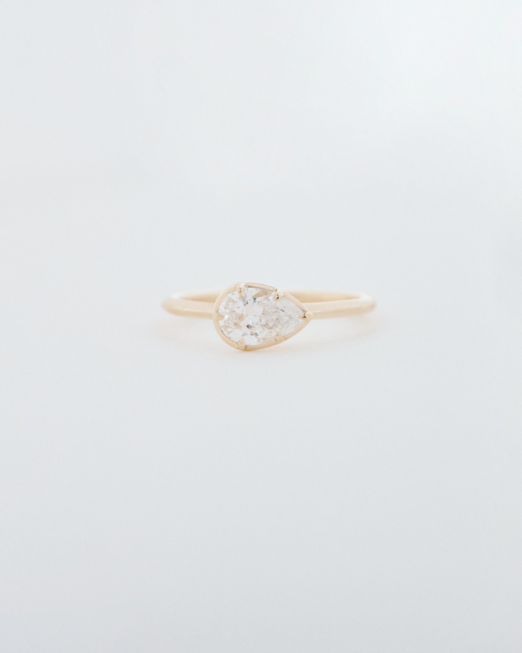 Pear Cut East-West Six Claw Engagement Ring