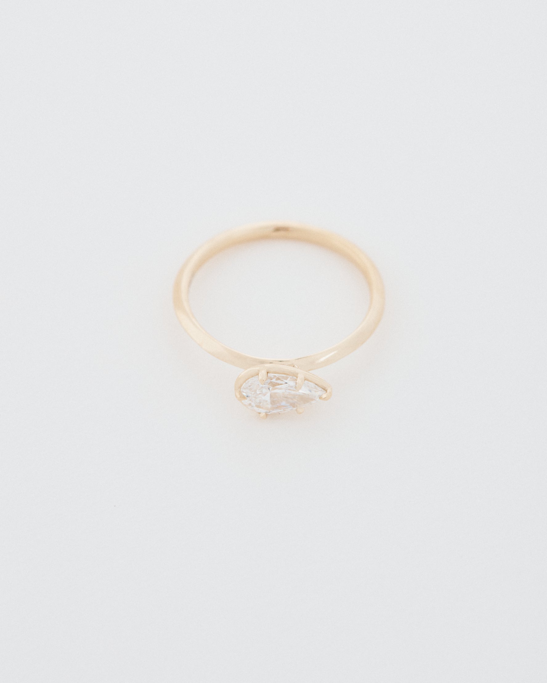Pear Cut East-West Six Claw Engagement Ring