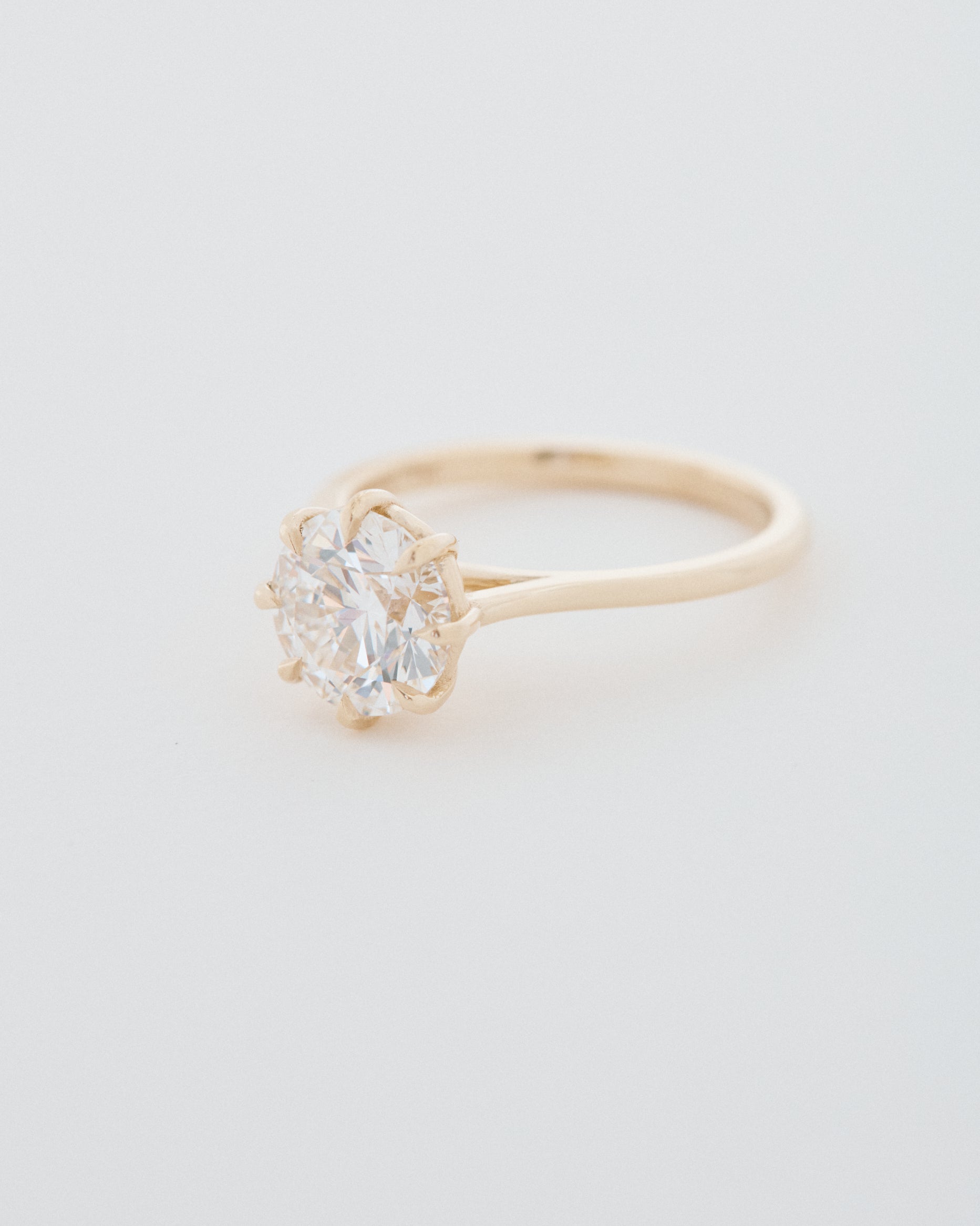 Round Brilliant Cut Eight Claw Engagement Ring