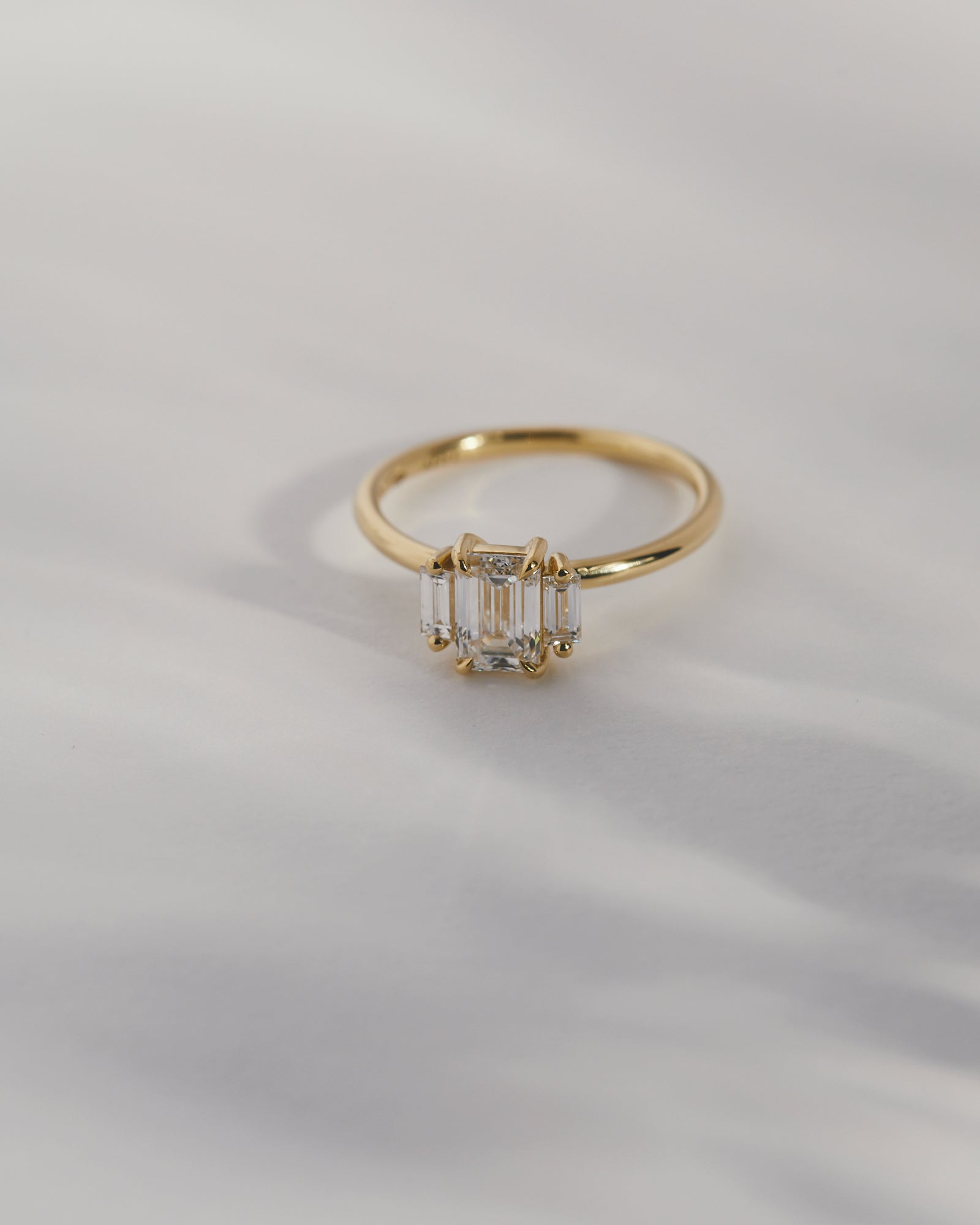 1.02ct emerald cut and baguette trilogy
