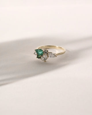Emerald, tourmaline and diamond cluster.