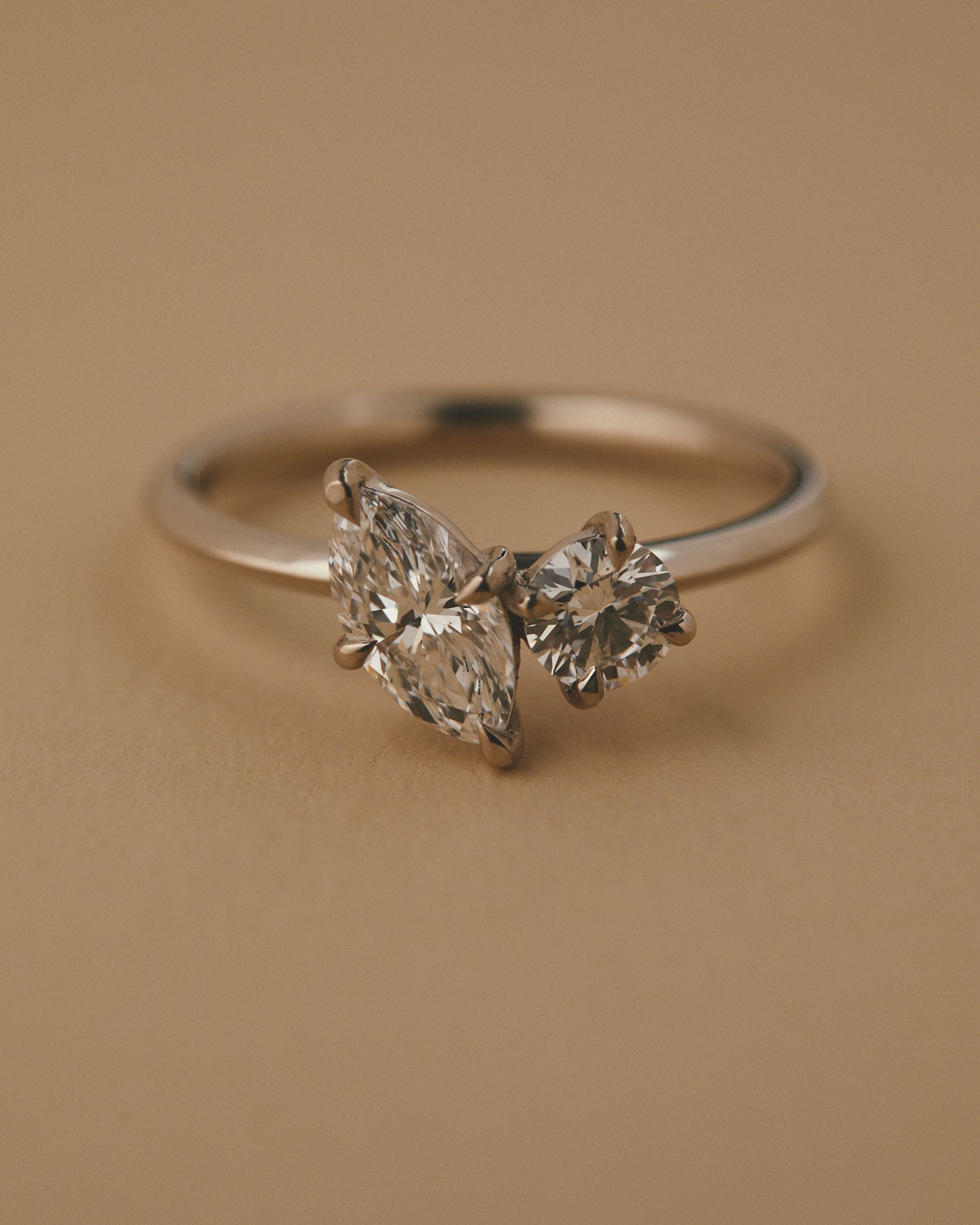 0.64ct Marquise and 0.45ct round cut diamond engagement ring.