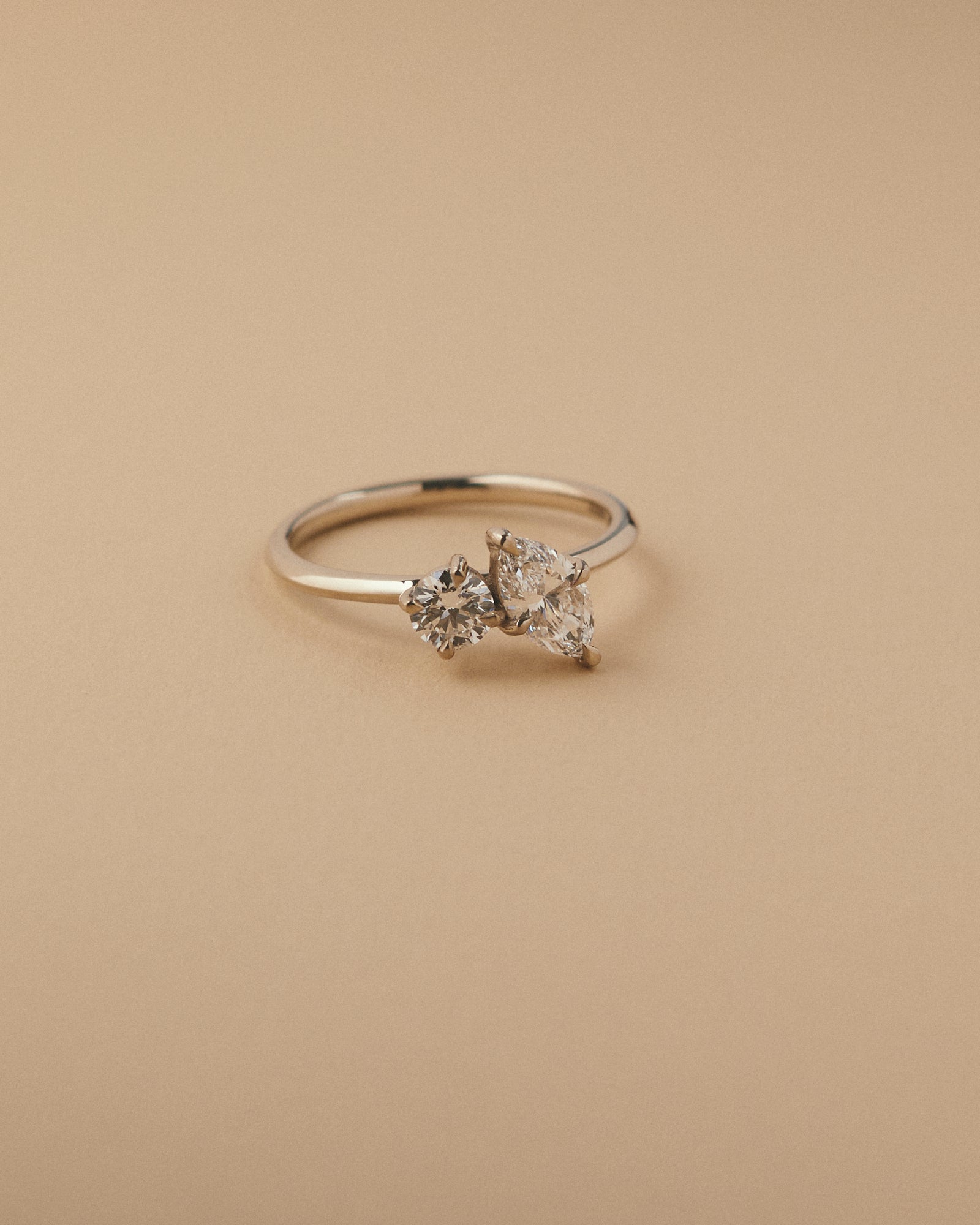 0.64ct Marquise and 0.45ct round cut diamond engagement ring.