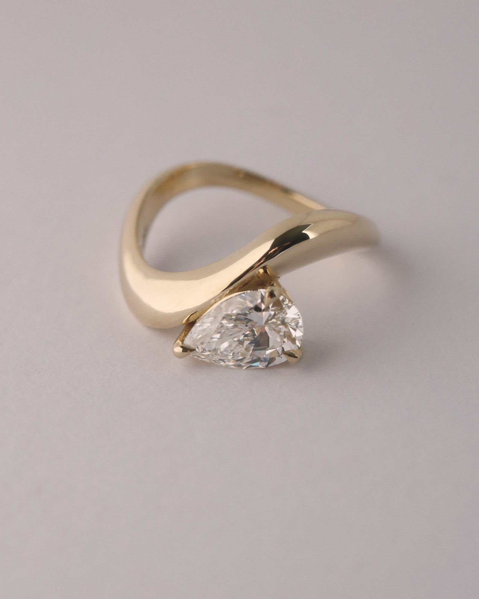 1.40ct pear cut wave solitaire