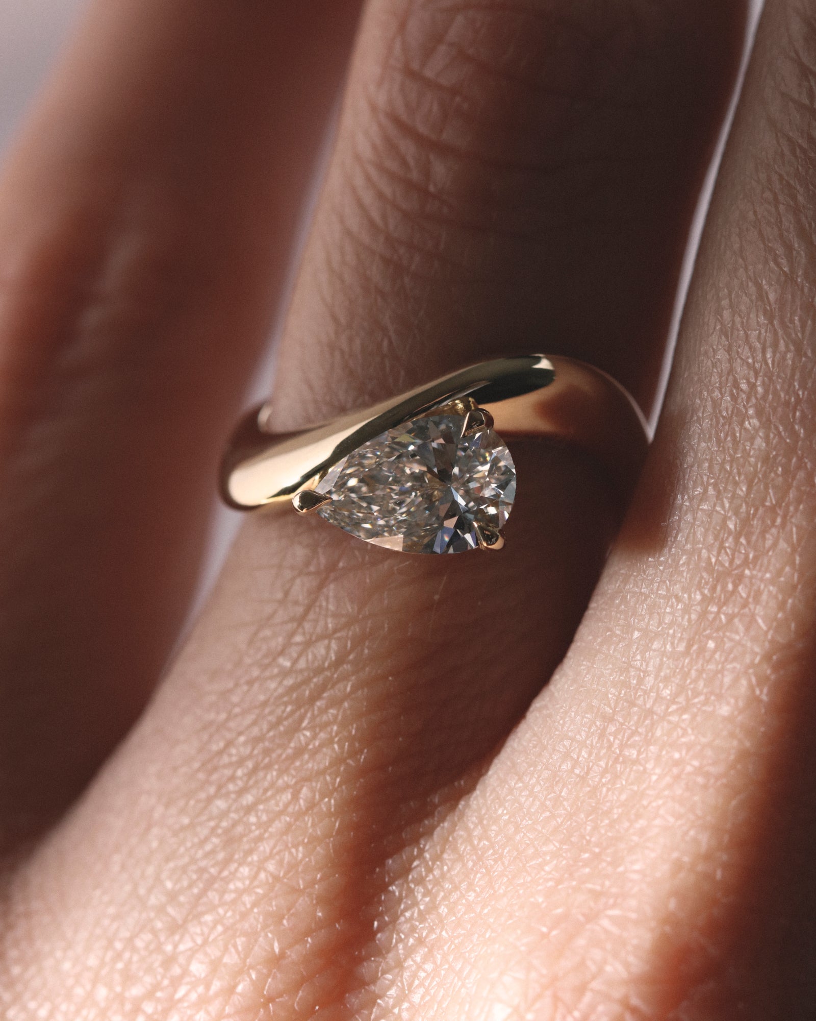 1.40ct pear cut wave solitaire