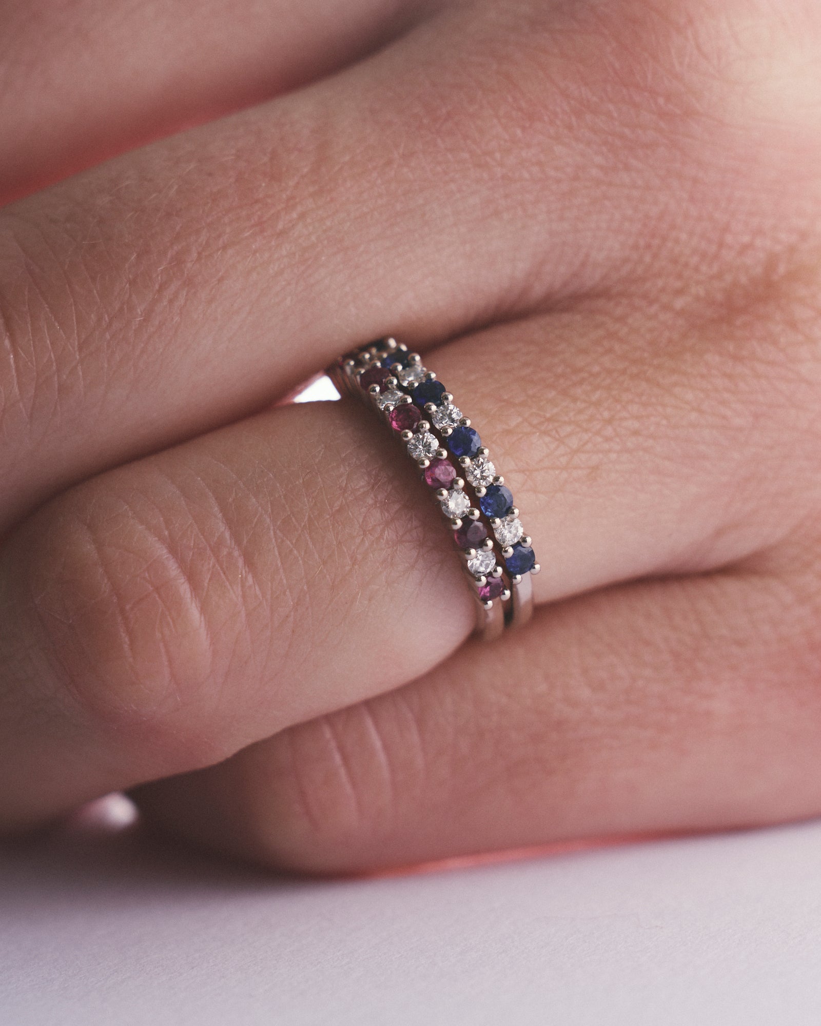 Sapphire, diamond and ruby half eternity stack