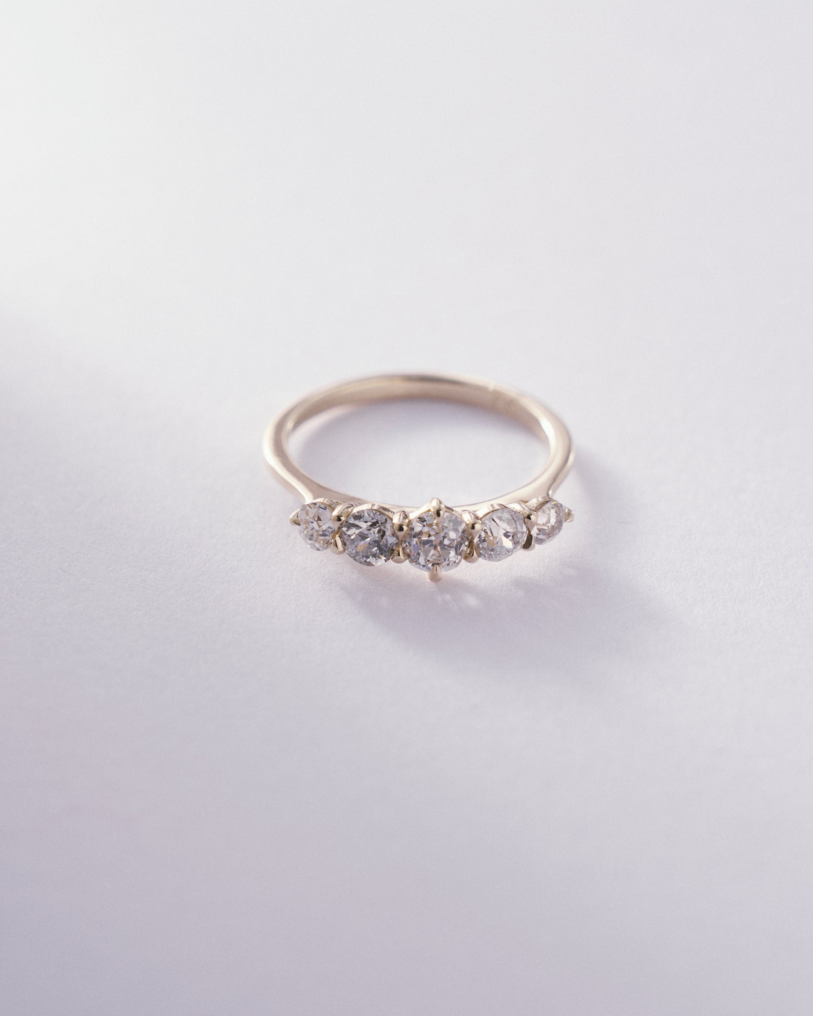 Old European cut five stone ring.
