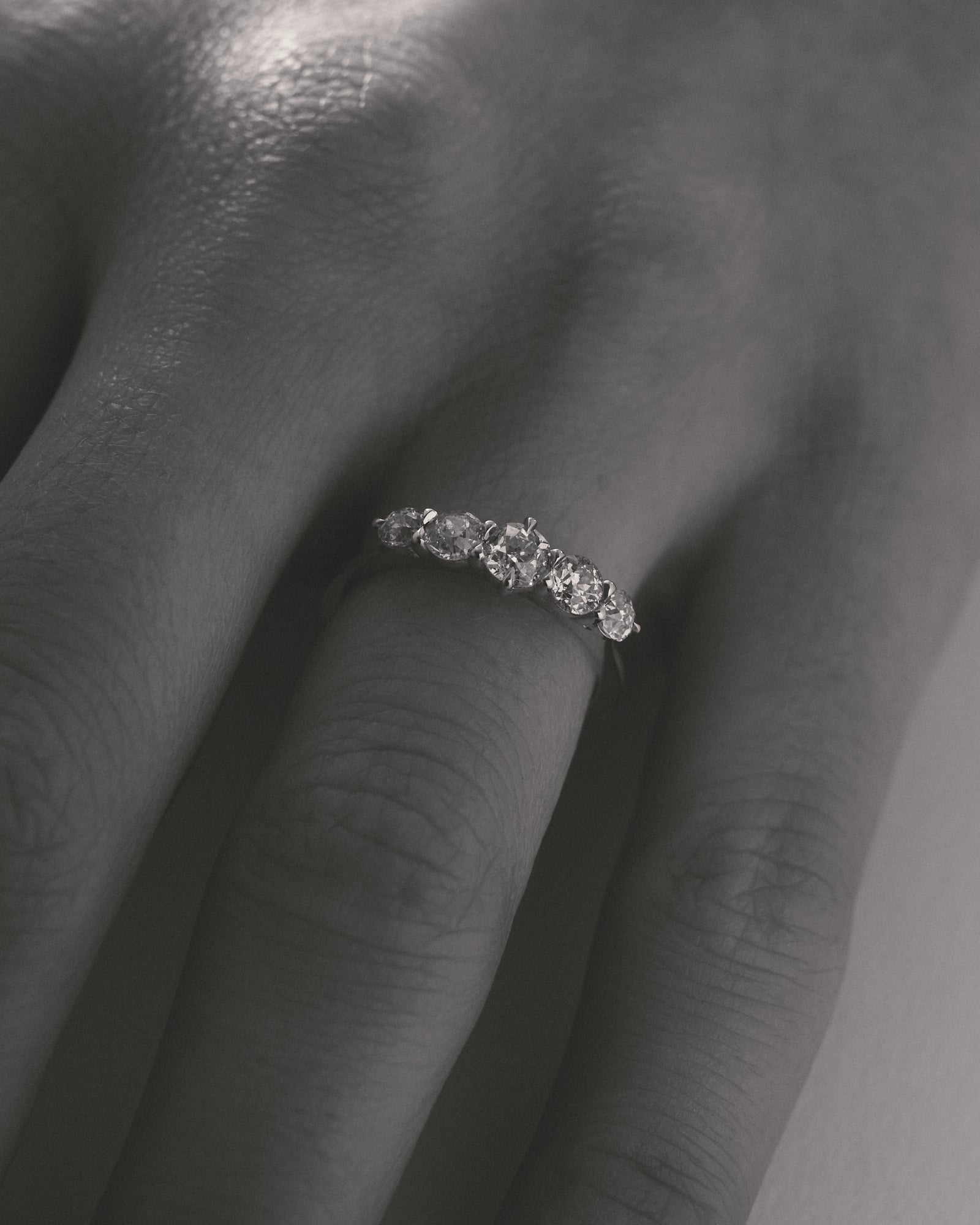 Old European cut five stone ring.
