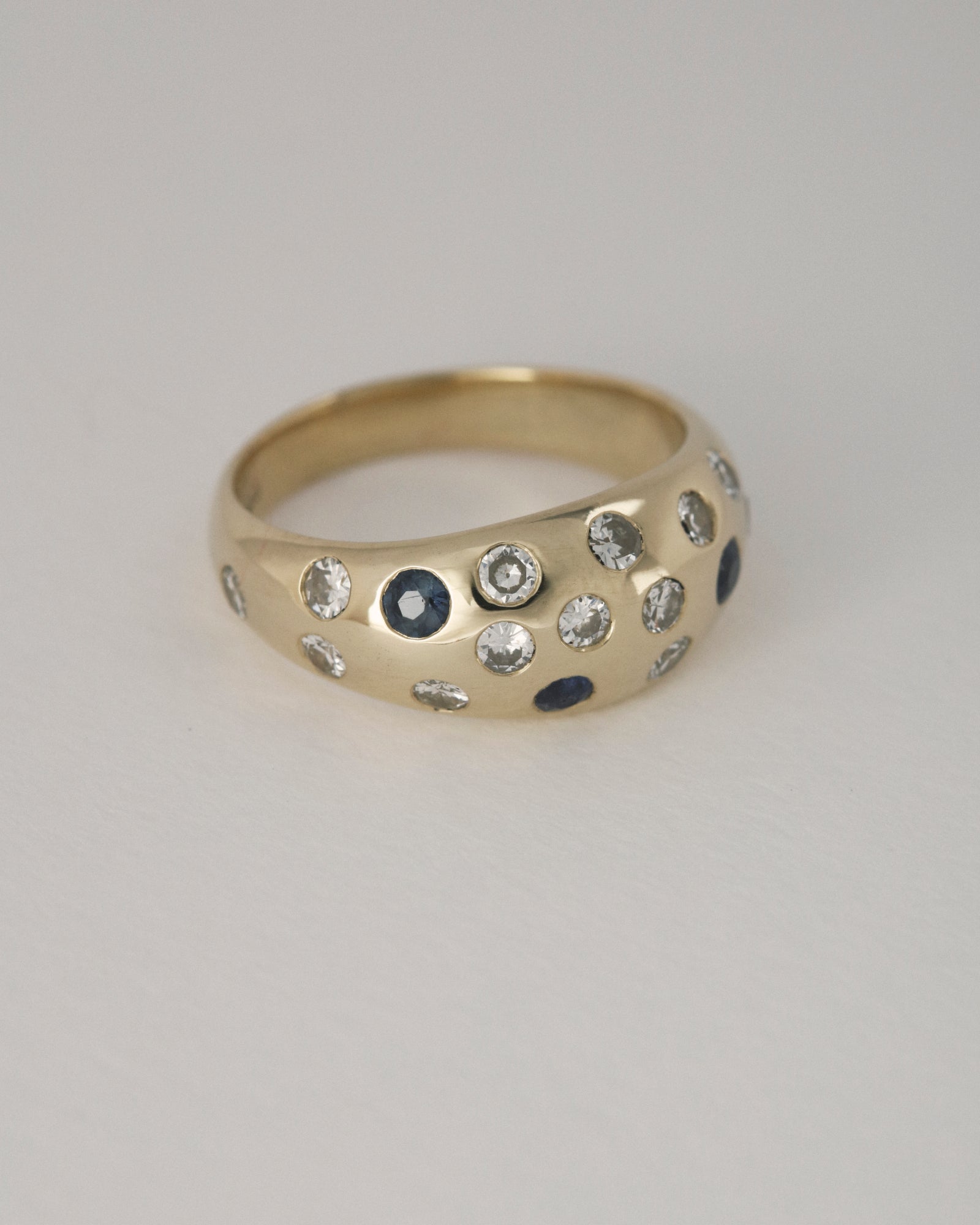 Diamond and sapphire dome ring
