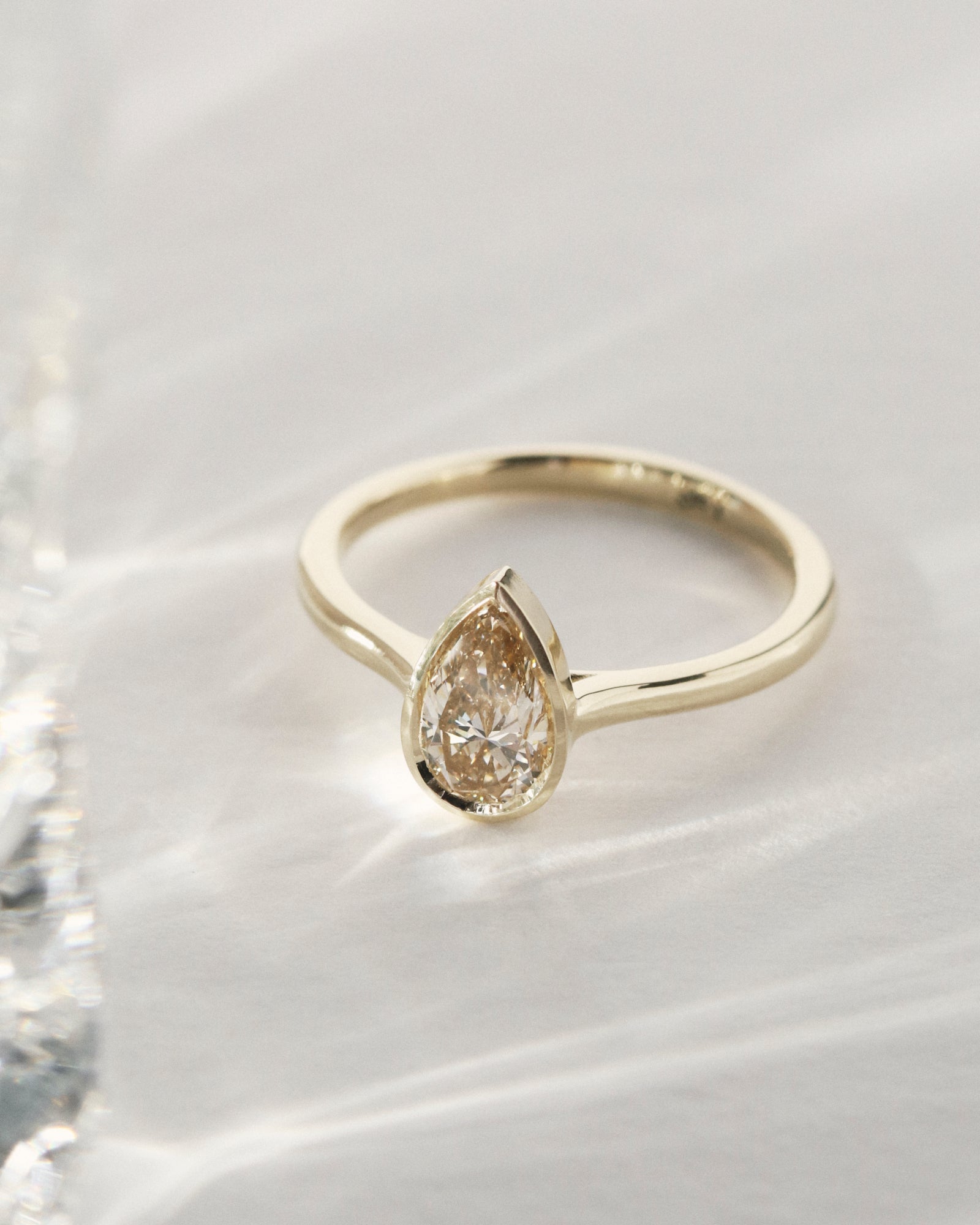 0.58ct pear cut champagne diamond solitaire