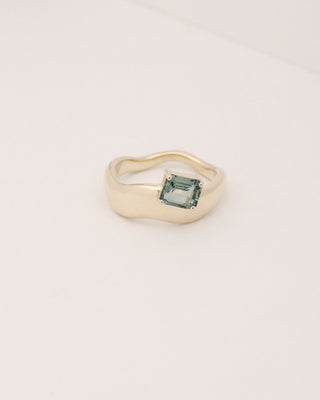 1.142ct sea-foam green emerald cut sapphire wave solitaire