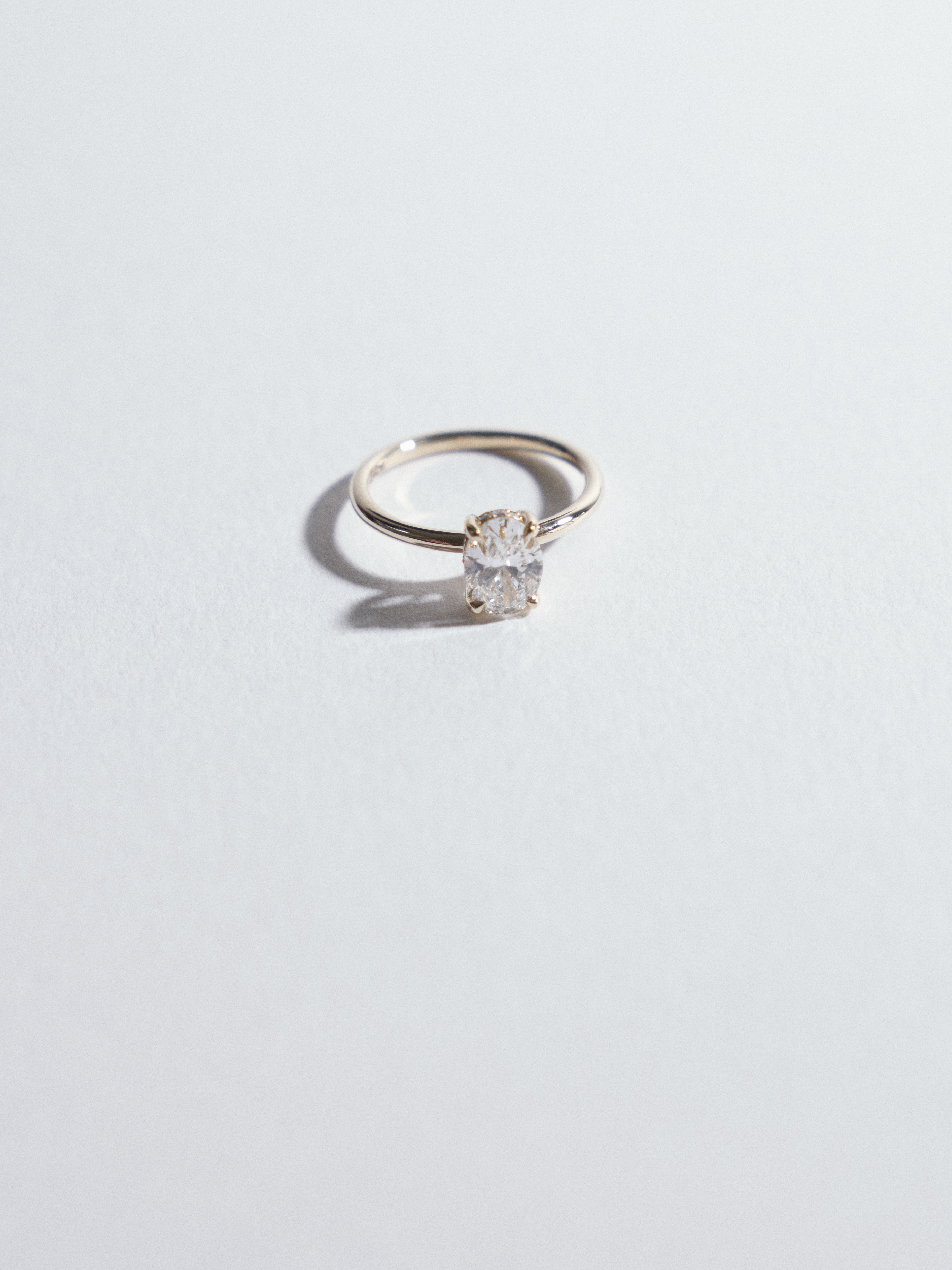 0.90ct Oval diamond solitaire with 0.005ct hidden halo.