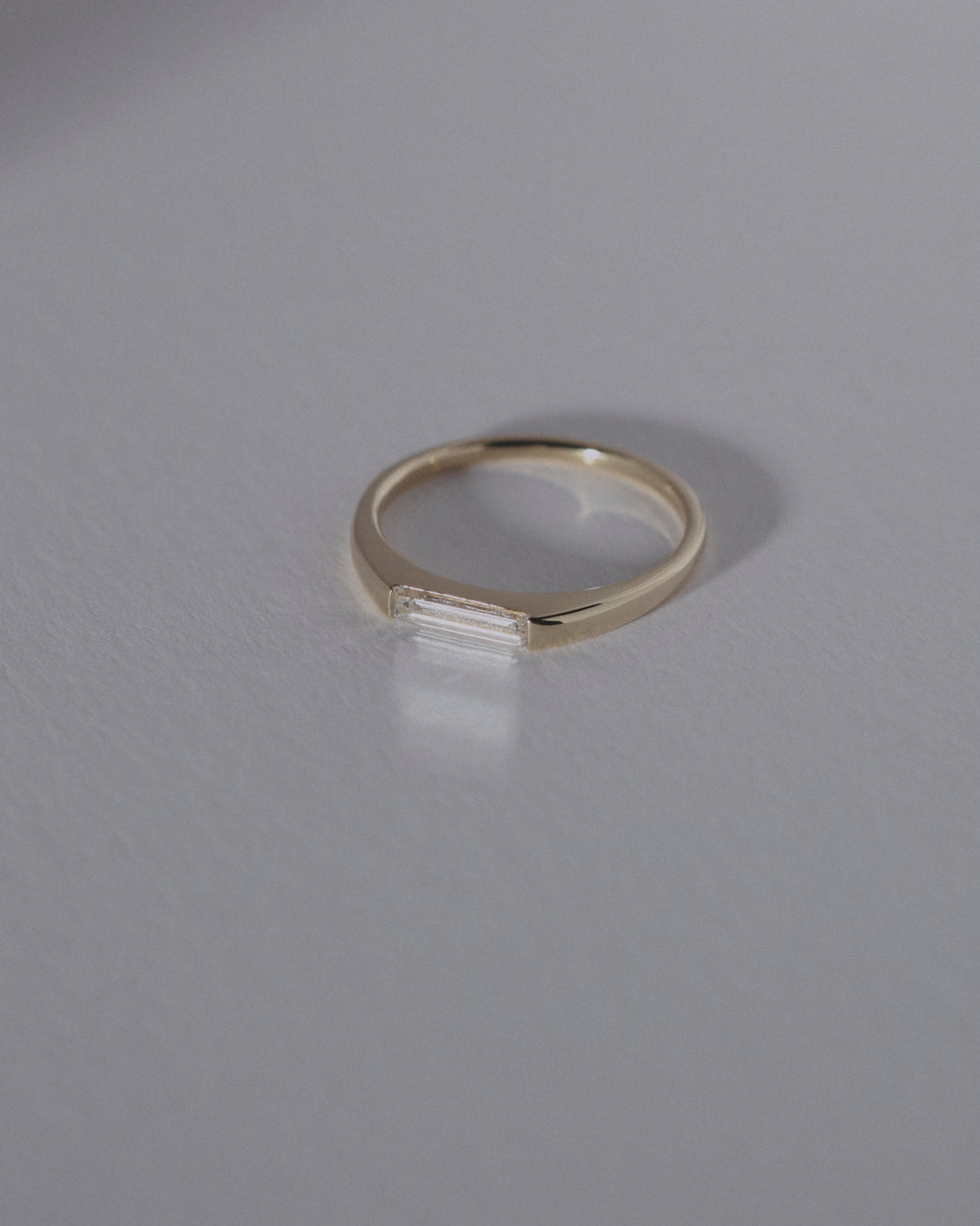 Elongated Baguette cut dainty signet